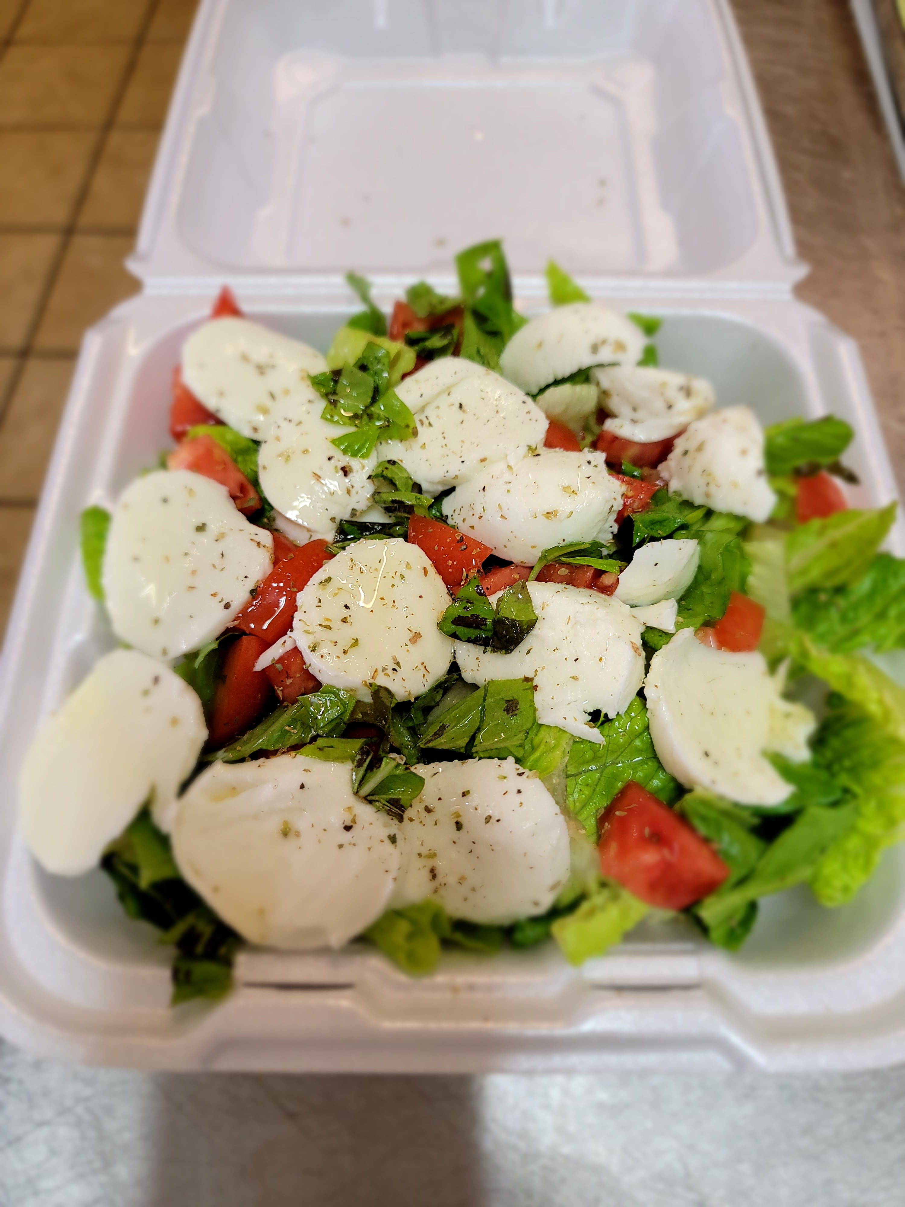 Order Capresa Salad - Salad food online from Tony Pizza store, Highspire on bringmethat.com