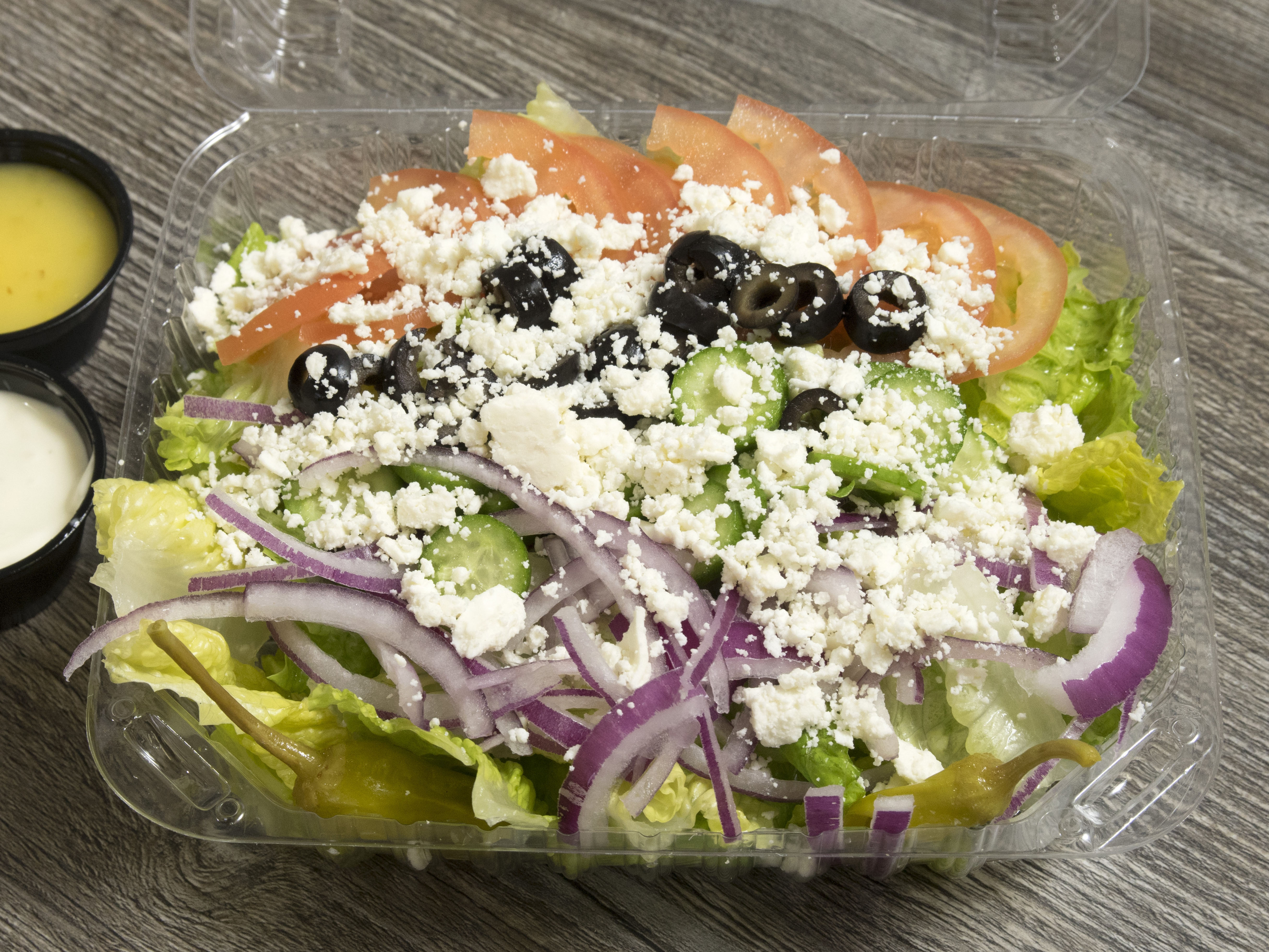 Order Greek Salad food online from Roma's Pizza store, Oceanside on bringmethat.com