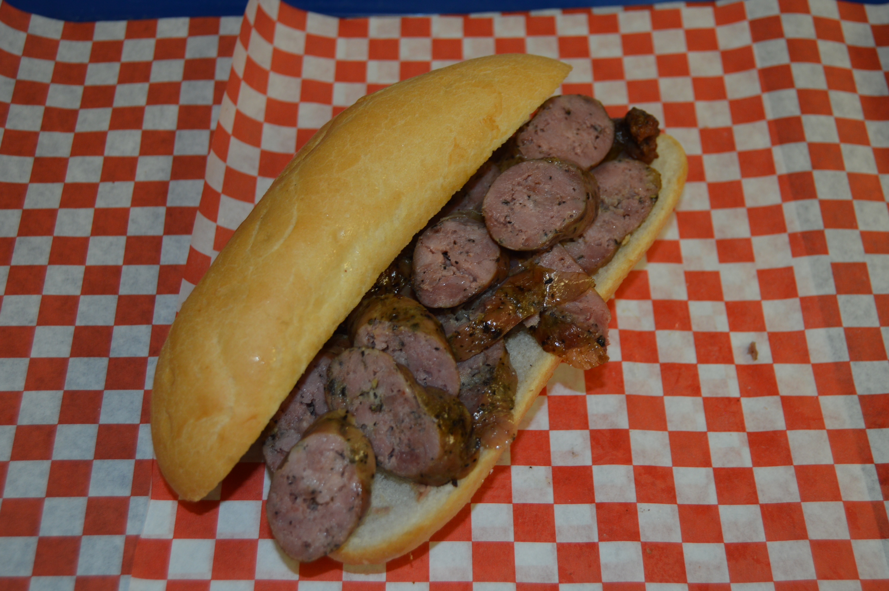 Order Regular Sausage Po Boy food online from Lyndon's Pit Bar-B-Q store, Houston on bringmethat.com