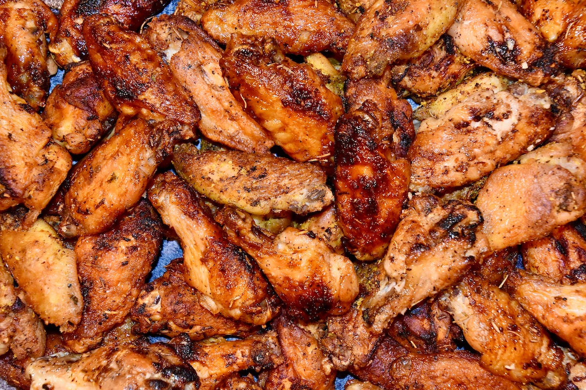 Order 50 Wings food online from The Roasted Wing store, Wilmington on bringmethat.com