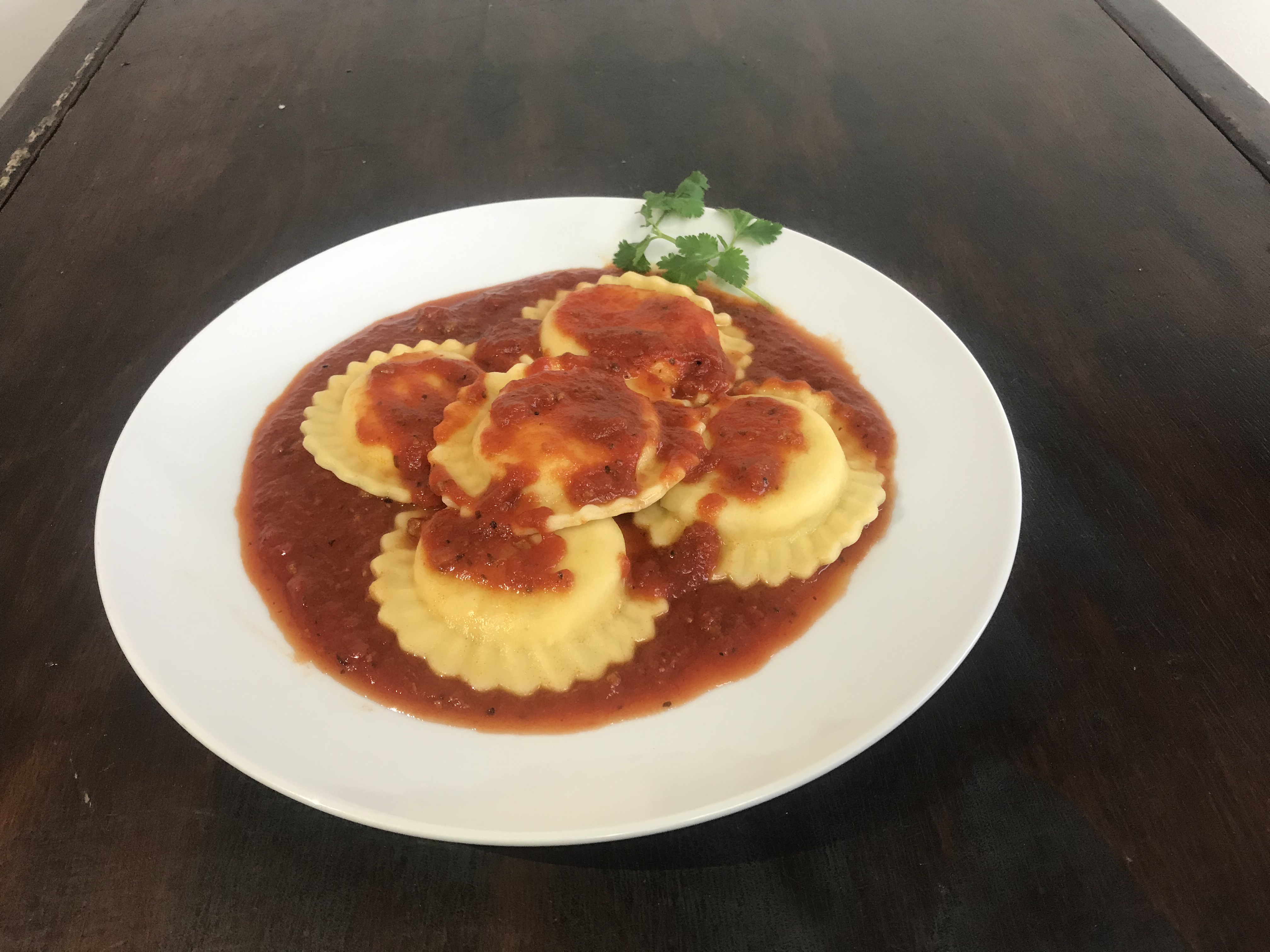 Order Family Size Ravioli with Meat Sauce food online from Palermo Pizza store, El Monte on bringmethat.com