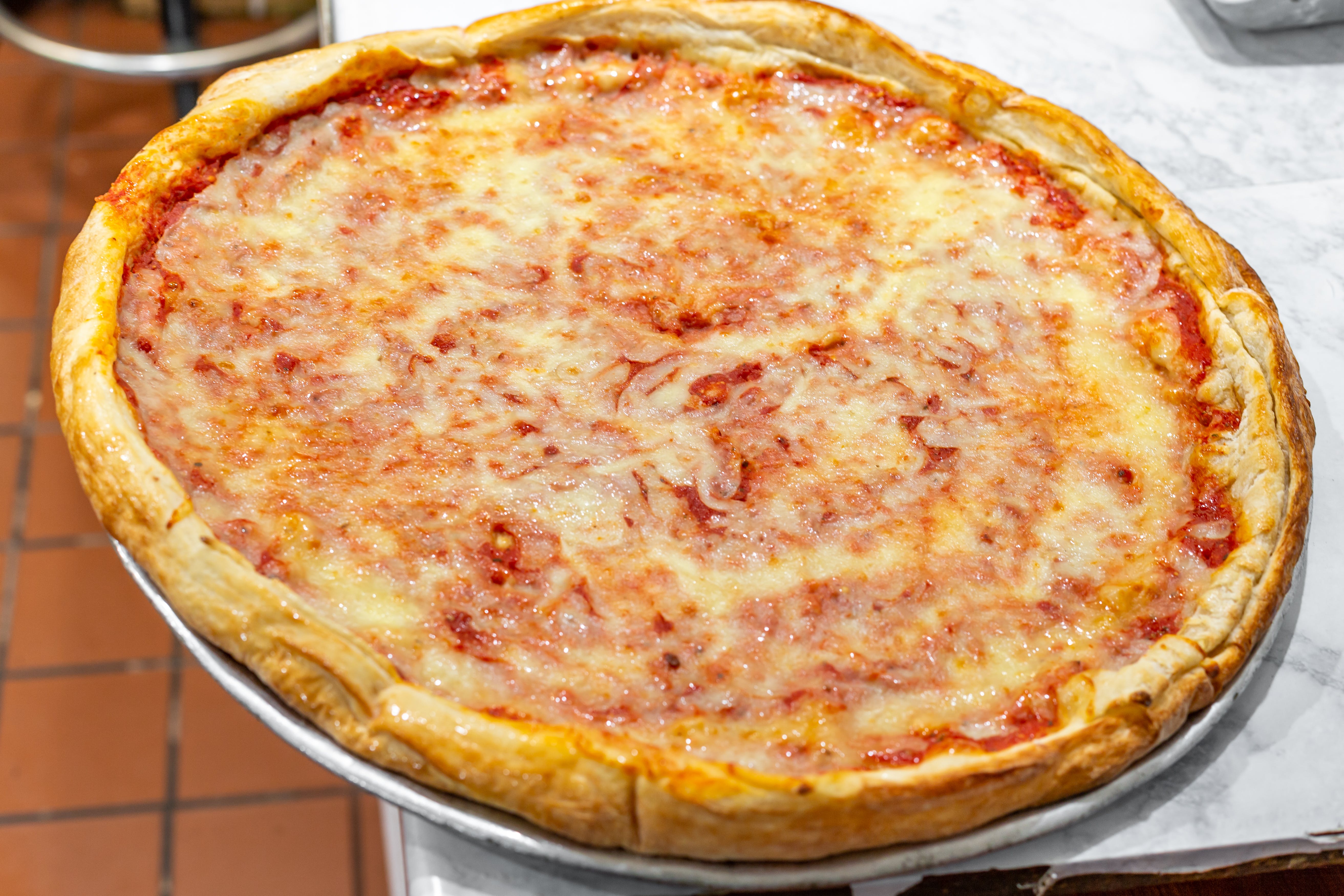 Order Cheese Pizza - Large food online from Port Jeff Pizza store, Port Jefferson on bringmethat.com