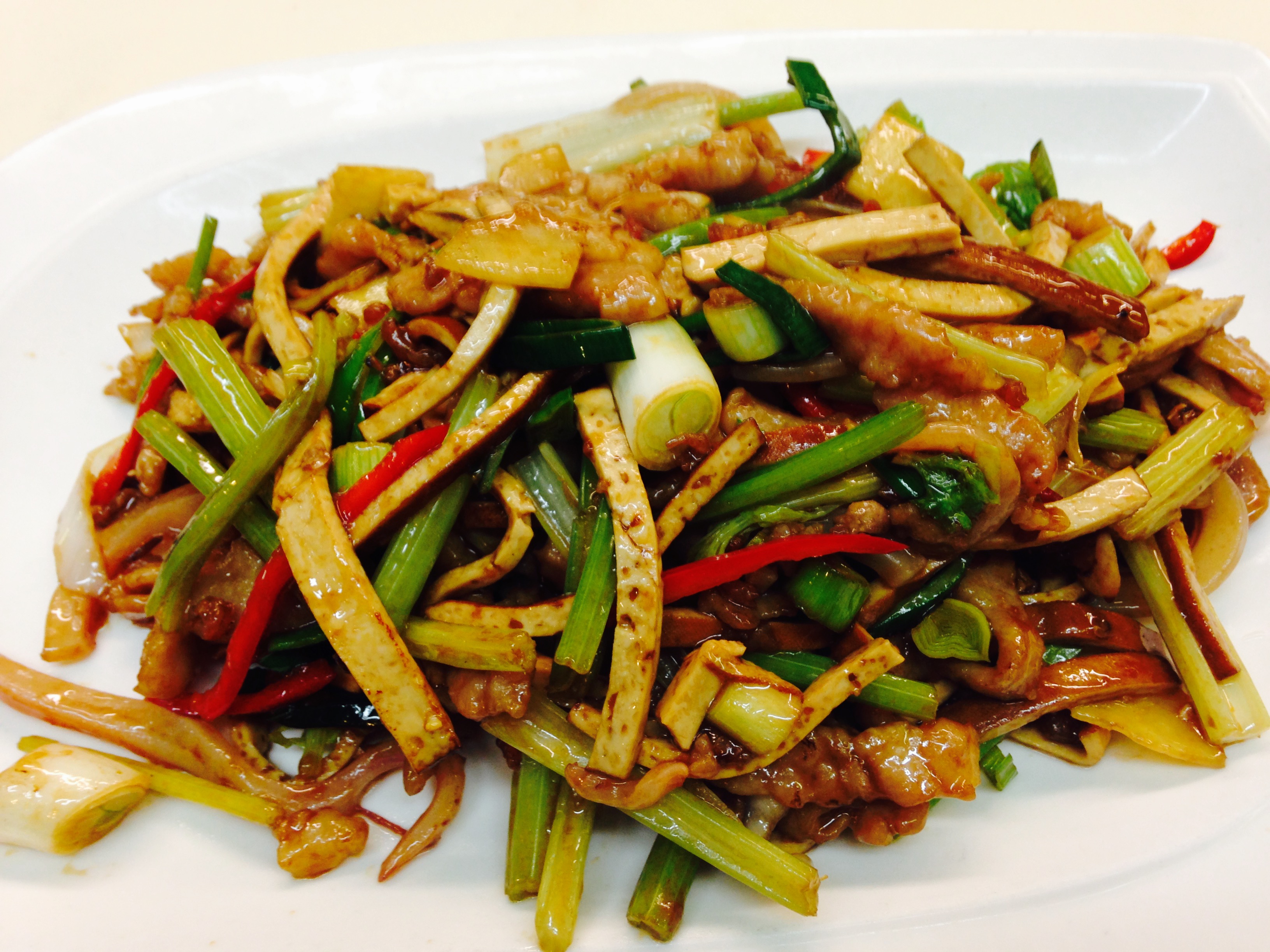 Order Stir Fried Pork with squid and bean curd food online from Joy Restaurant store, San Mateo on bringmethat.com