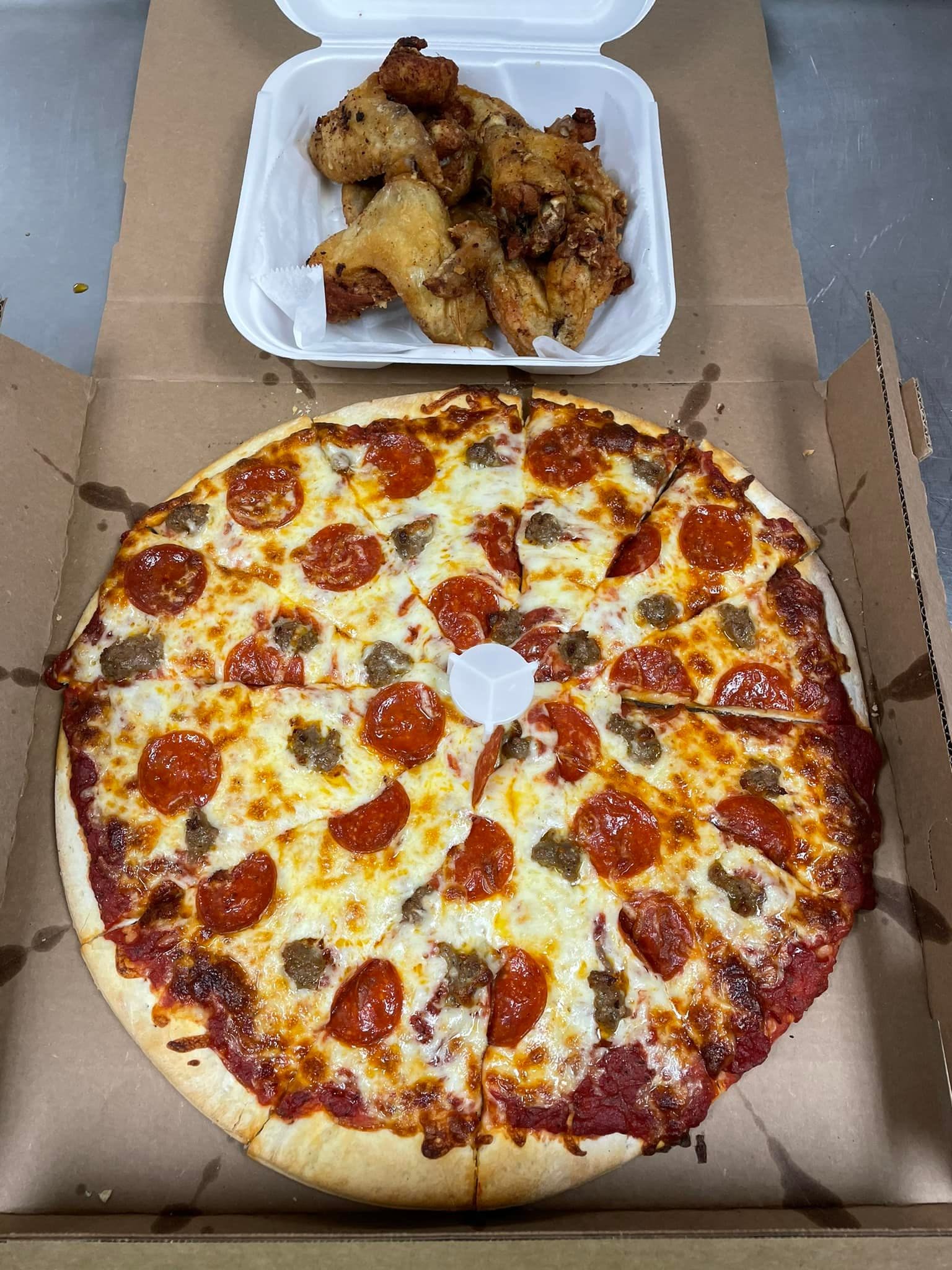 Order Pizza & Wings Special - Special food online from Pizza Man store, Ellsworth on bringmethat.com