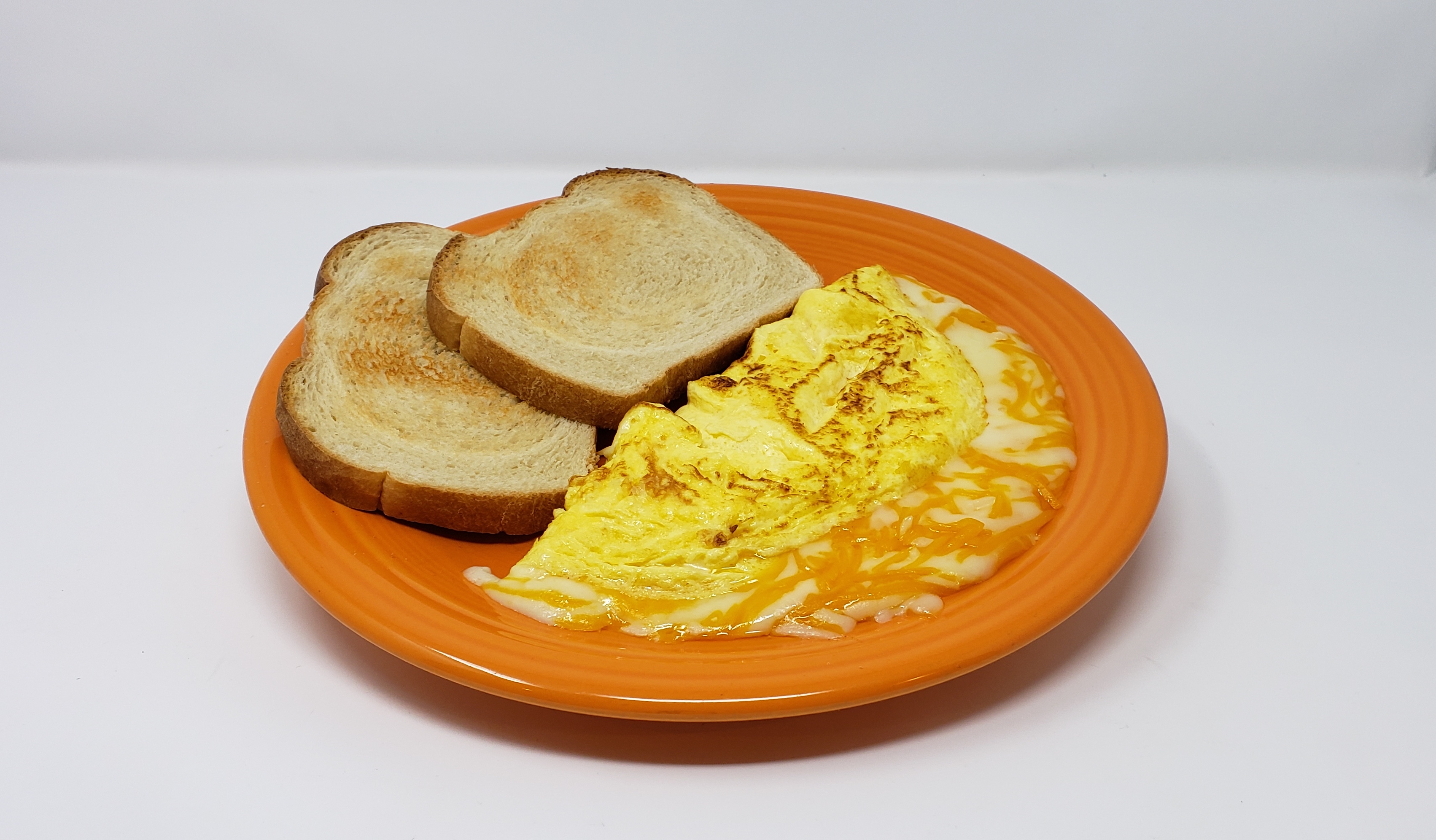 Order Three Cheese Omelet food online from Geraldine Kitchen store, Jeffersonville on bringmethat.com