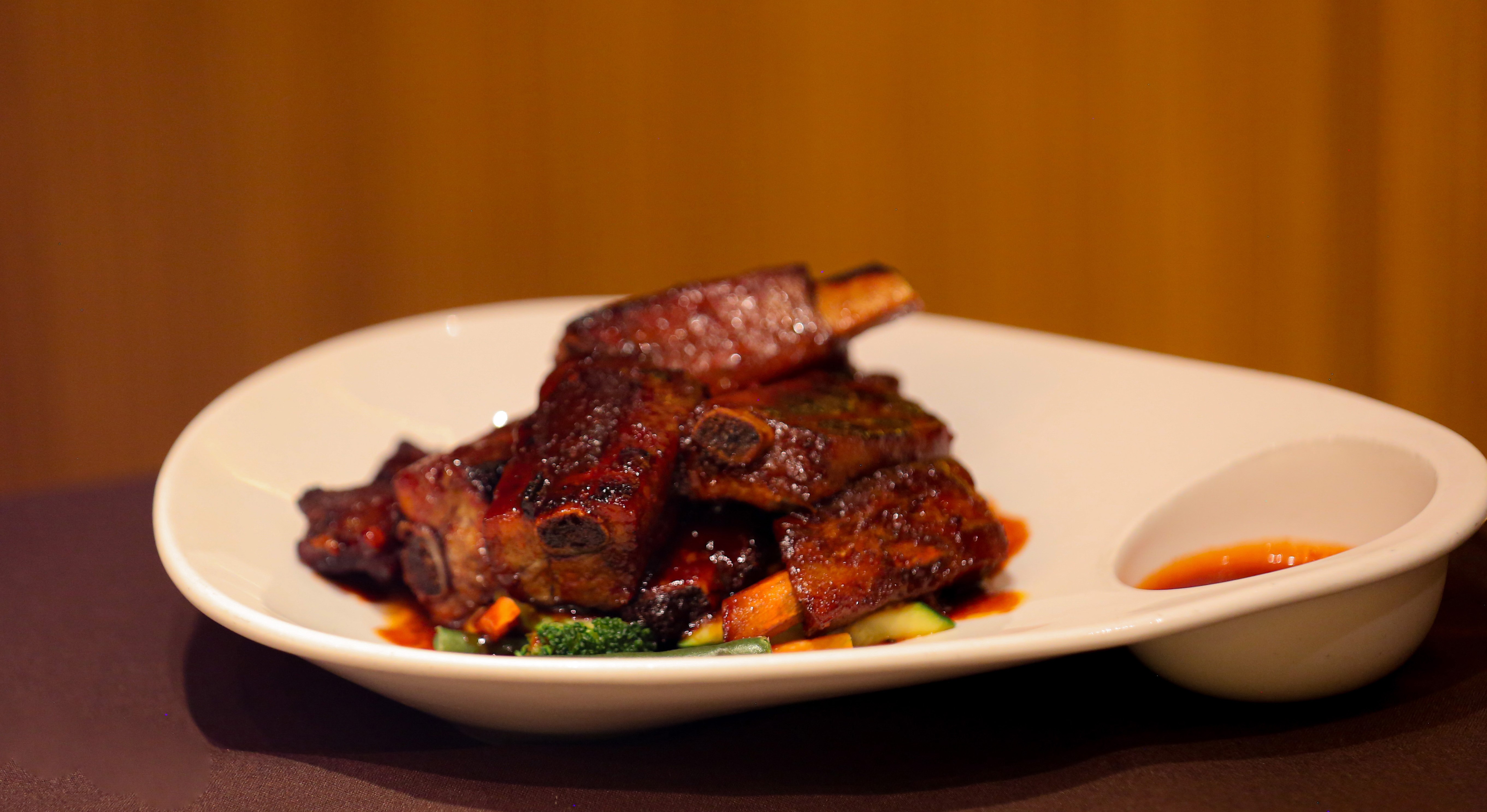 Order 8 Piece Grilled Baby Spare Ribs food online from MoCA Woodbury store, Woodbury on bringmethat.com