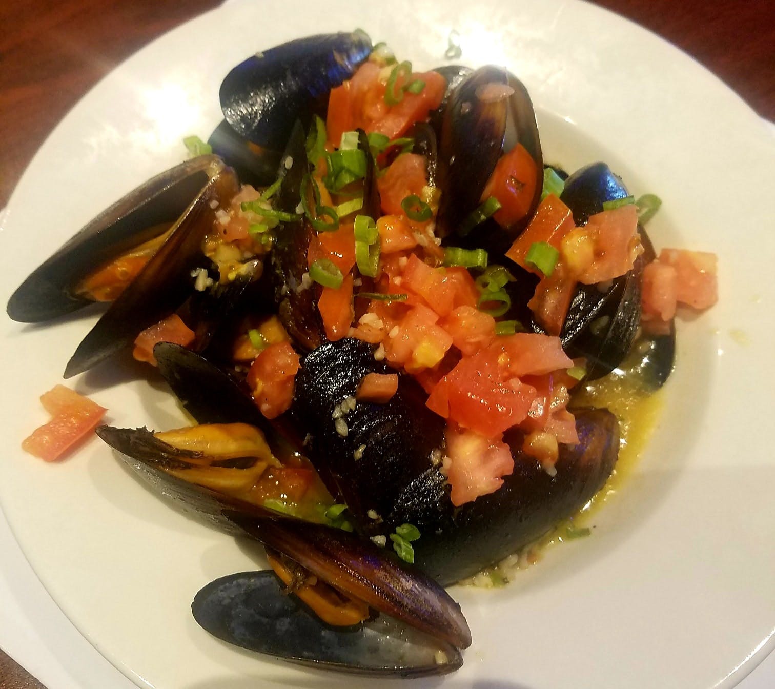 Order Mussels - 1 Lb. food online from Giovanni Pizza & Sports Pub store, Akron on bringmethat.com