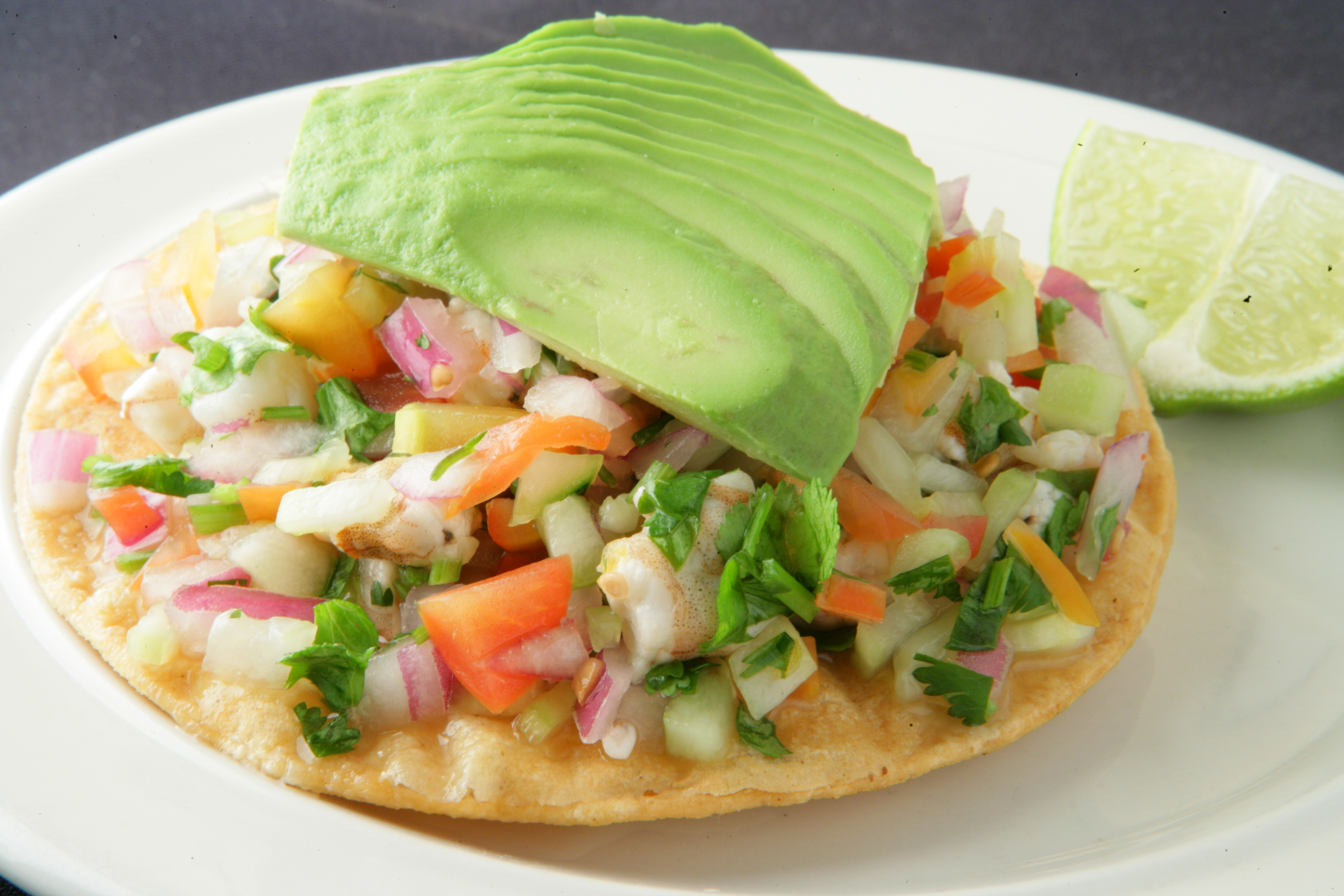 Order #102. Ceviche Tostada food online from Chapala Mexican Restaurant store, Brentwood on bringmethat.com