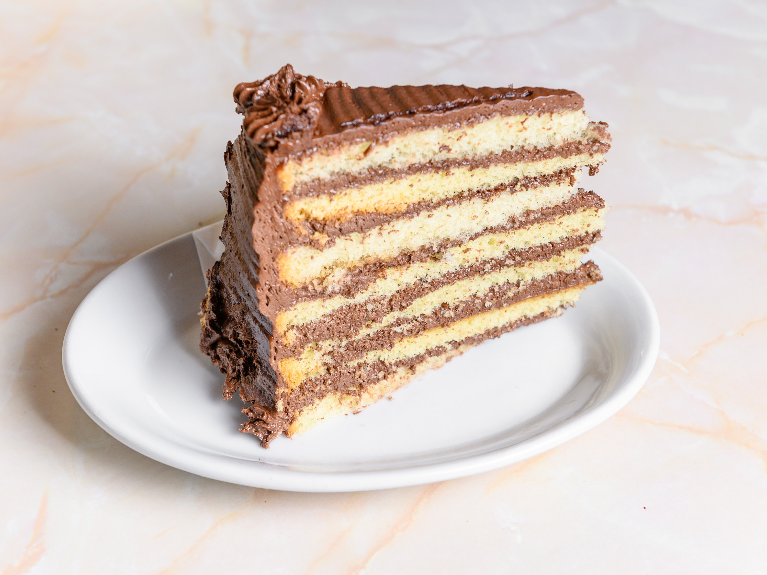 Order Chocolate 7 Layer Cake food online from Ritz Diner store, New York on bringmethat.com