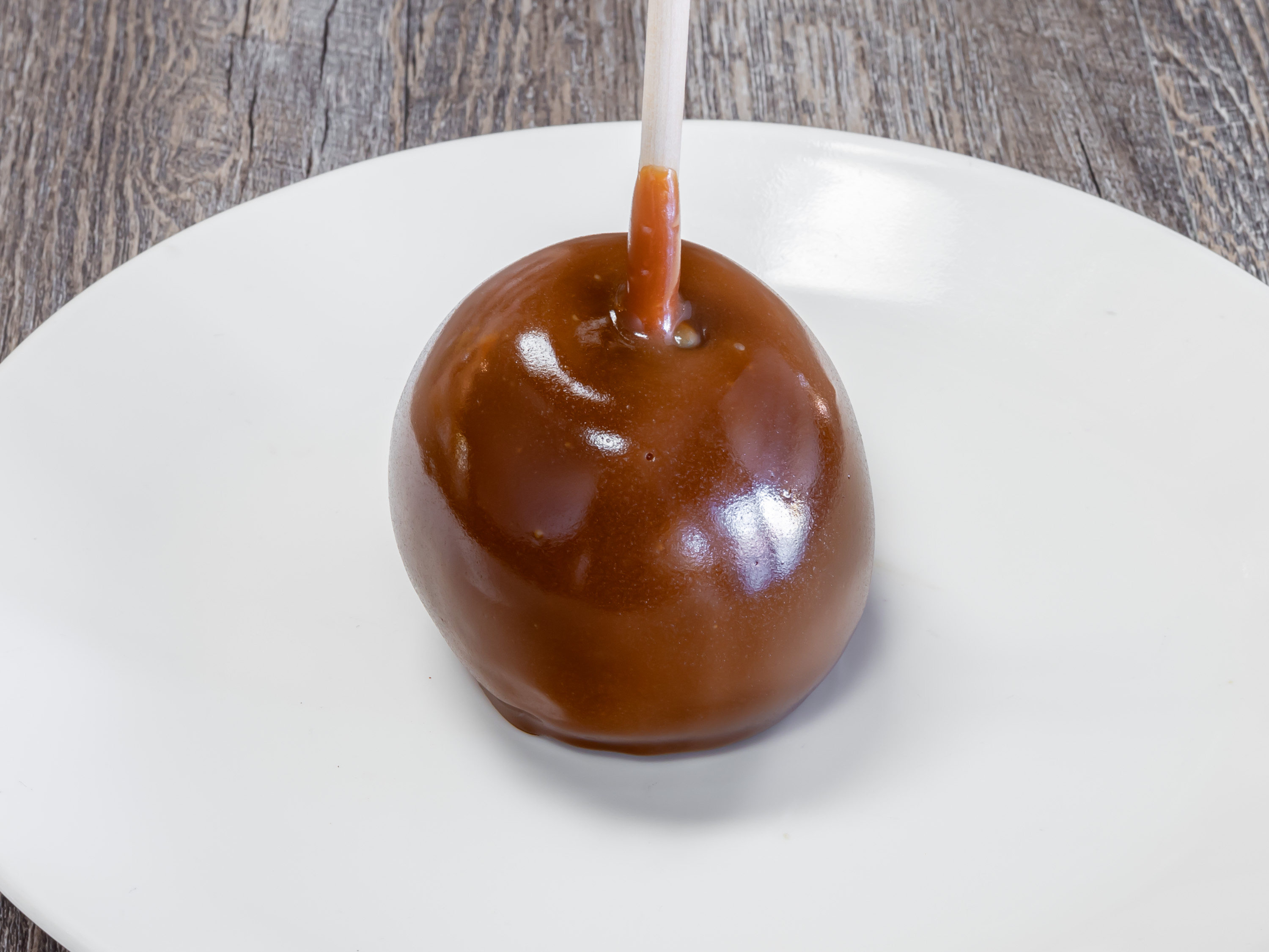 Order Plain Caramel Apple food online from Rocky Mountain Chocolate Factory store, Houston on bringmethat.com