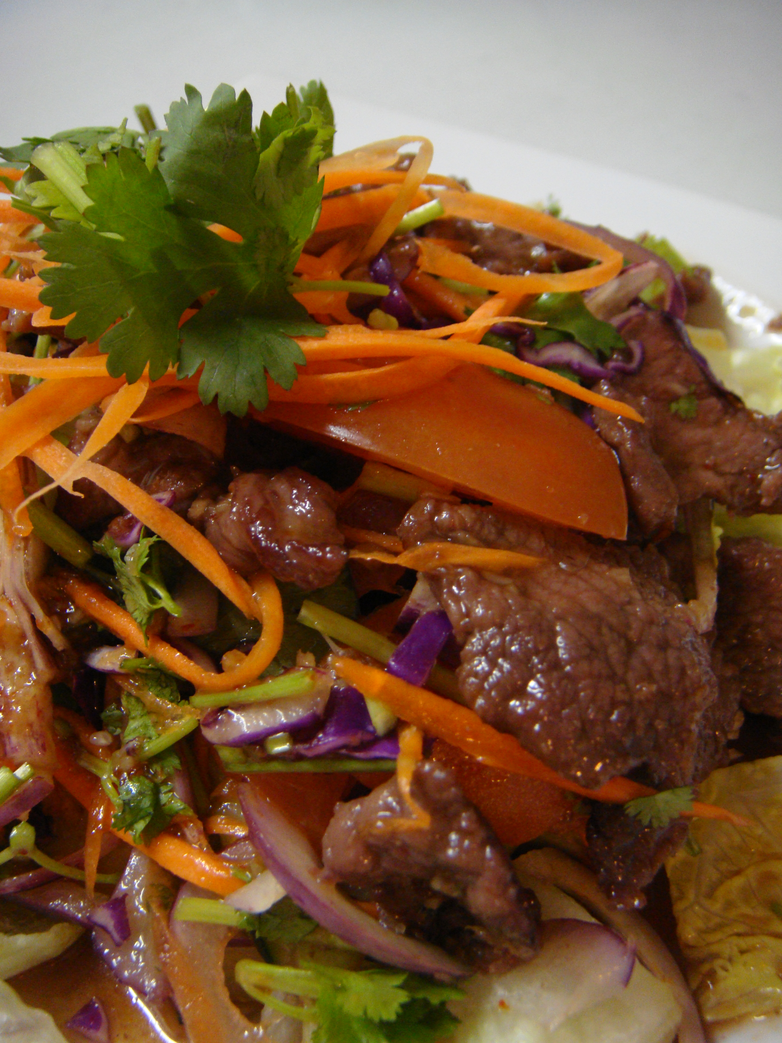 Order 16. Grilled Beef Salad food online from Thai boulevard store, Forest Hills on bringmethat.com