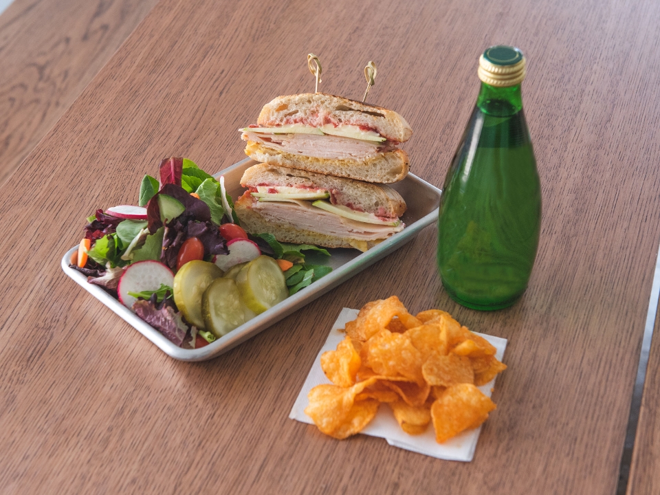 Order Turkey, Green Apple, Brie Panini Combo food online from Spring St Cafe store, Los Angeles on bringmethat.com