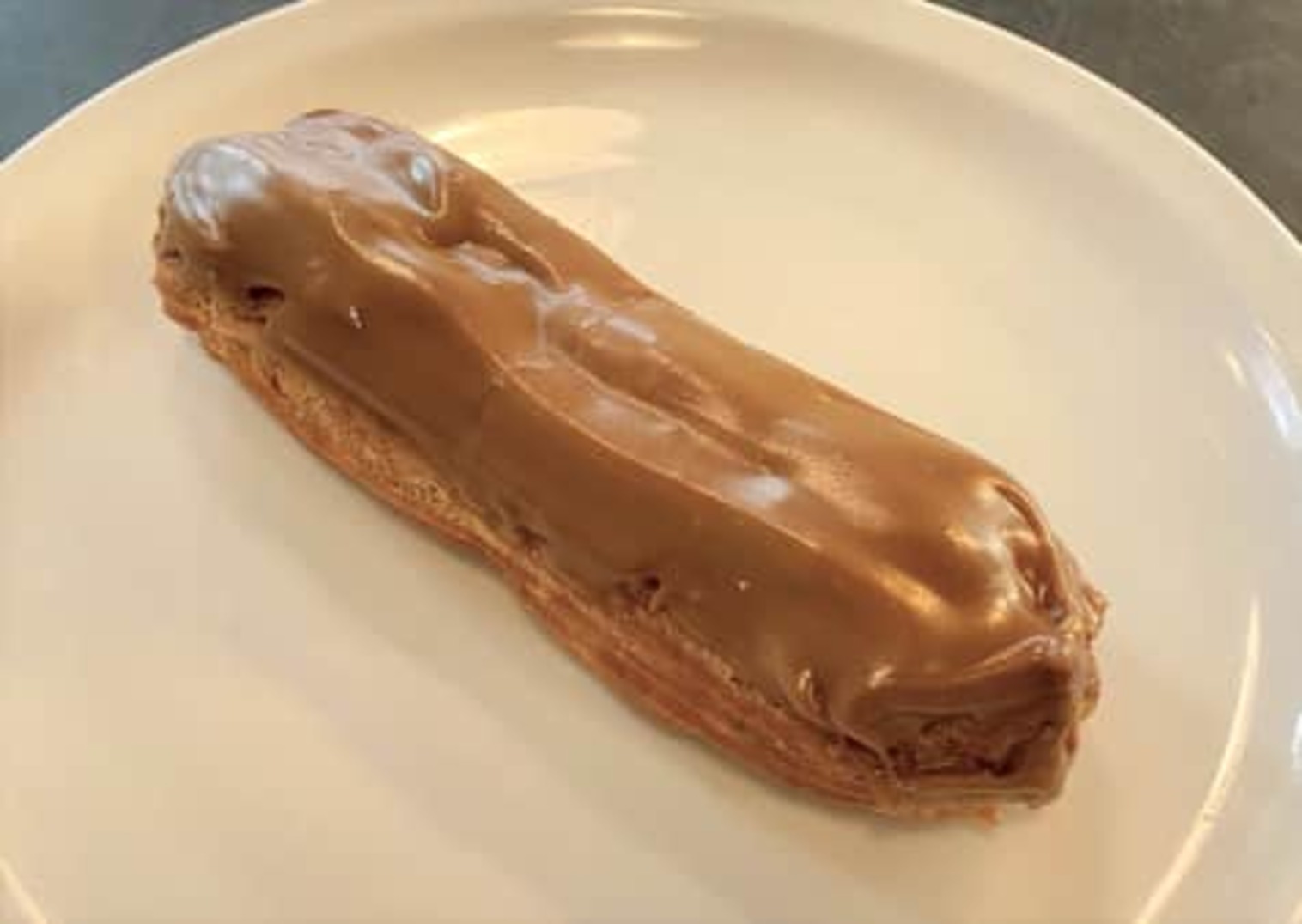 Order Cafe' Eclair food online from St. Honore Boulangerie store, Portland on bringmethat.com