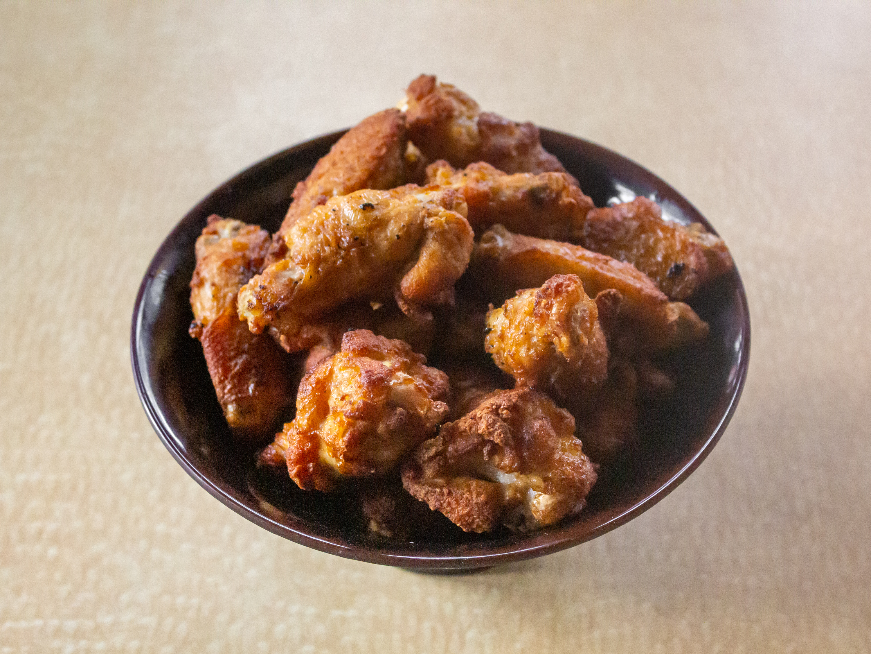 Order Traditional Crispy Bone in Wings (due to USA chicken shortage supplies may vary) food online from 1872 Cafe store, Rochester on bringmethat.com
