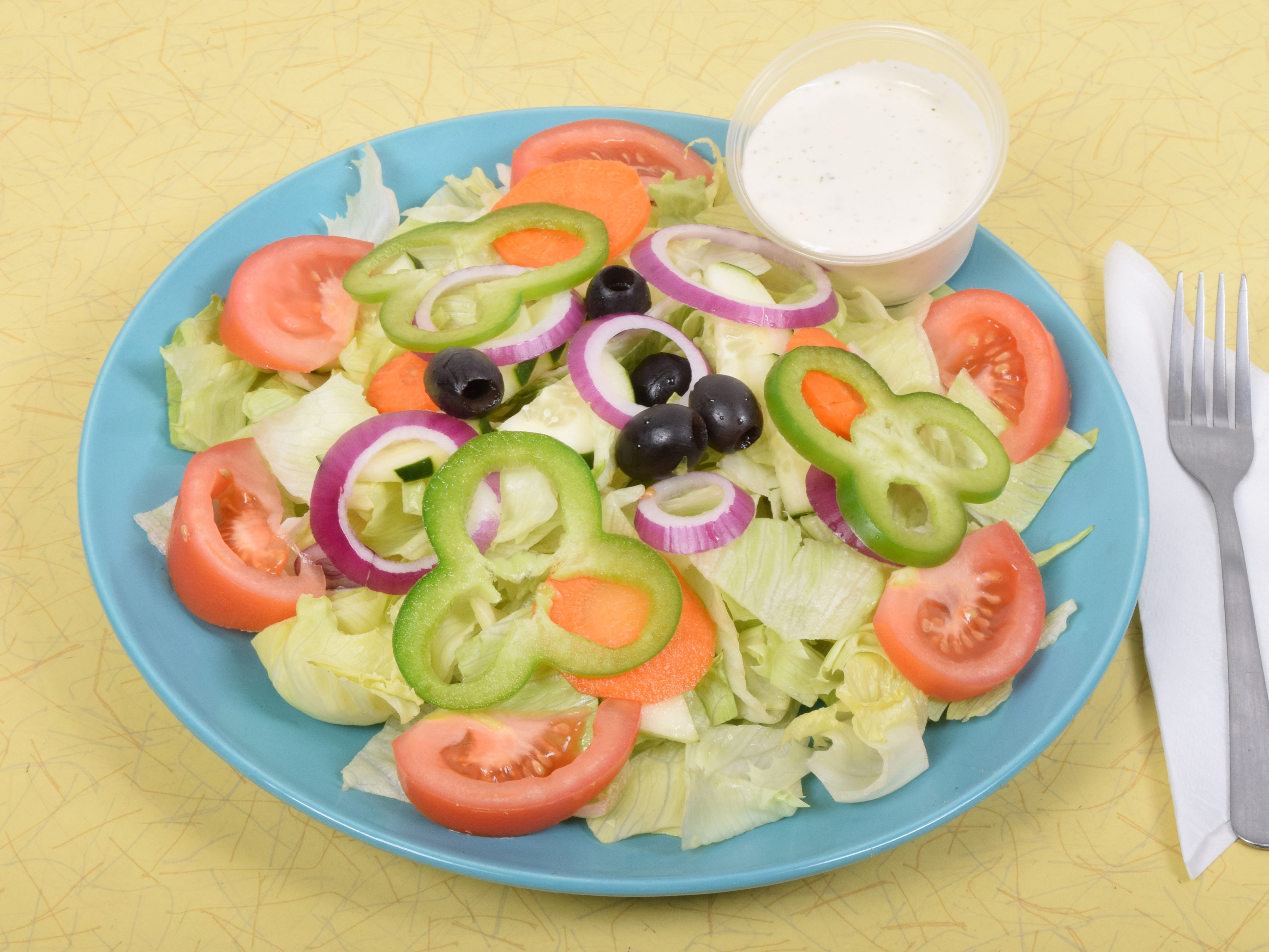 Order Tossed Salad food online from Lucy Pizza store, Stamford on bringmethat.com