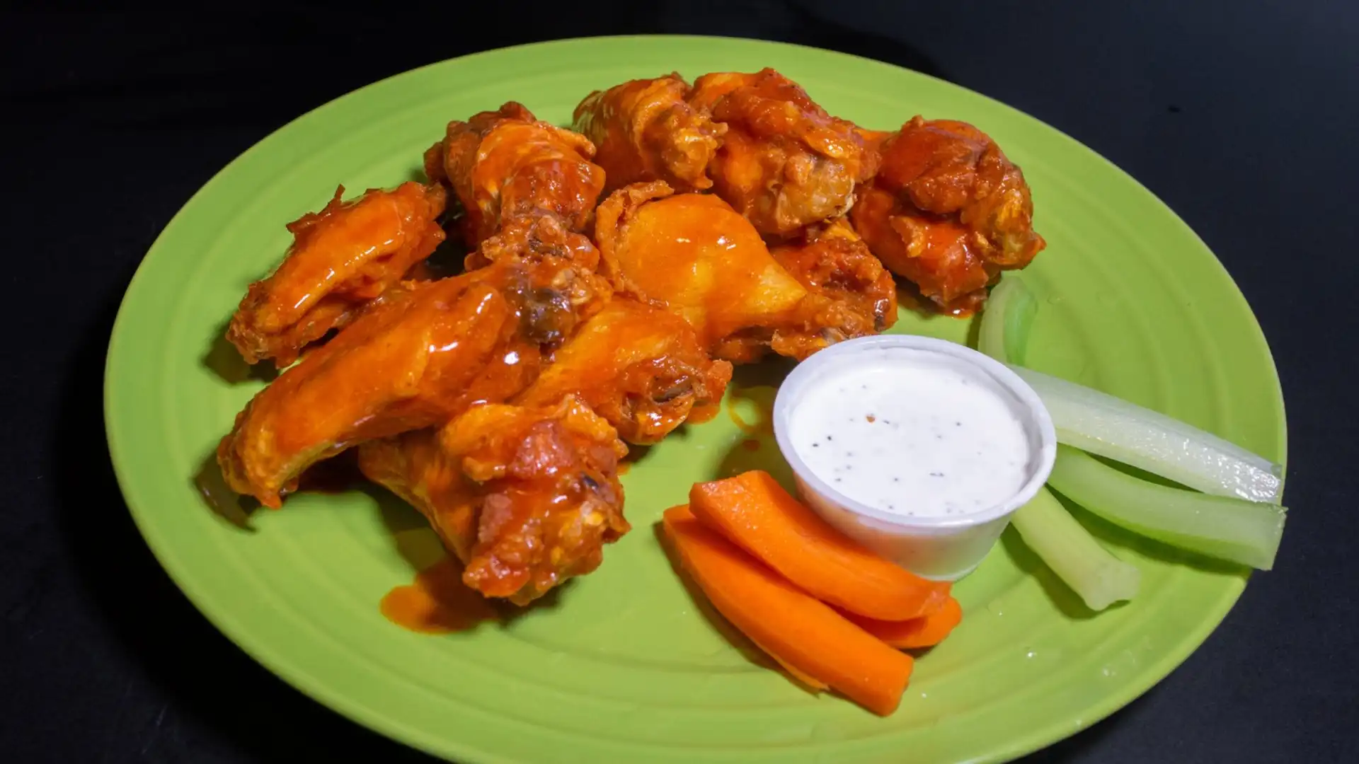 Order 10 Wings food online from The Shuffle Inn store, Canton on bringmethat.com
