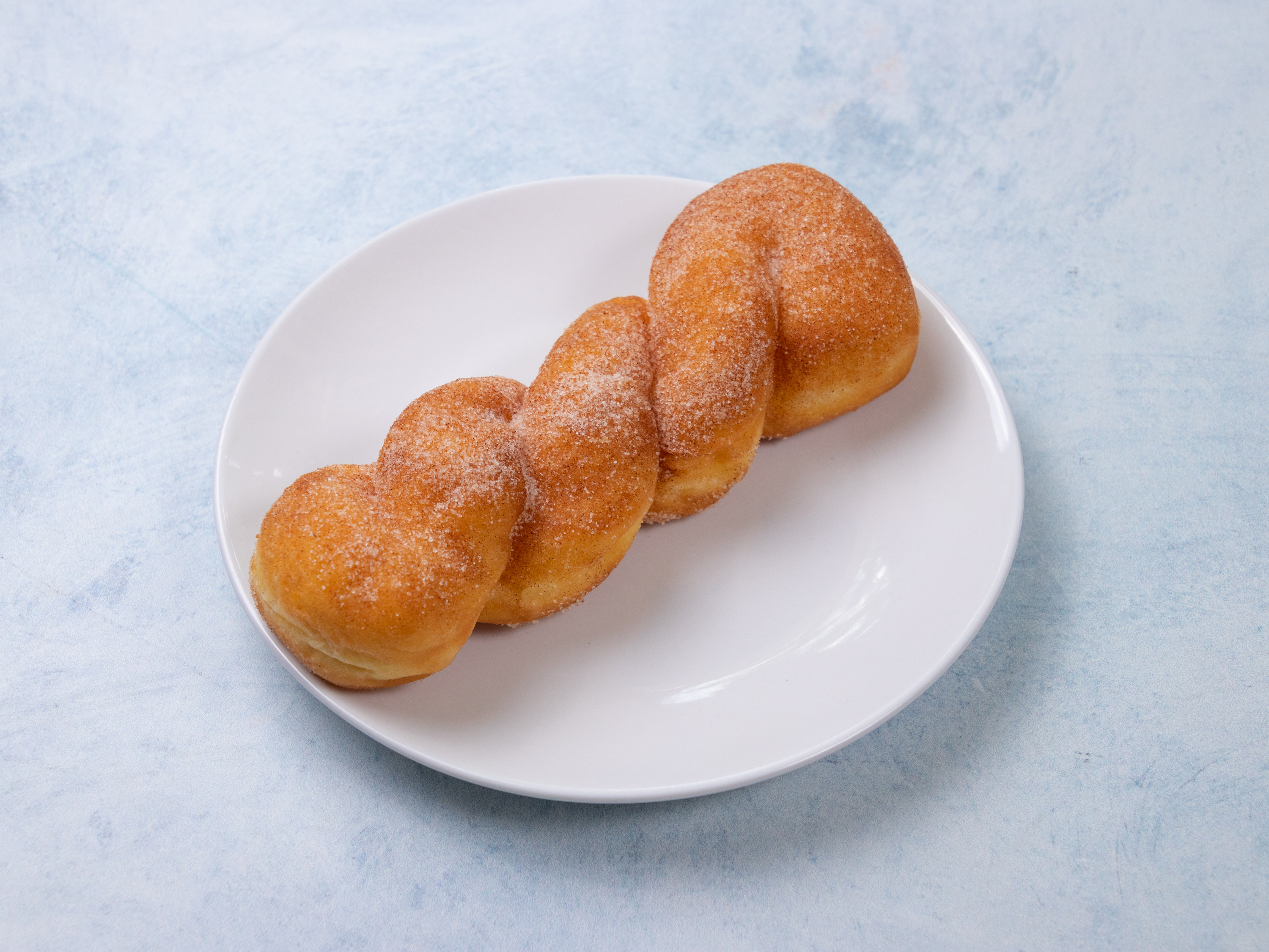Order Twist Donut (Cinnamon Sugar) food online from Joy Donuts store, Dacula on bringmethat.com