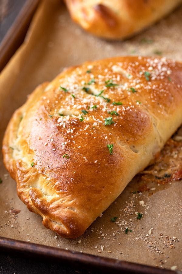 Order Cheese Calzone - Calzone food online from Sals Pizza store, Appleton on bringmethat.com