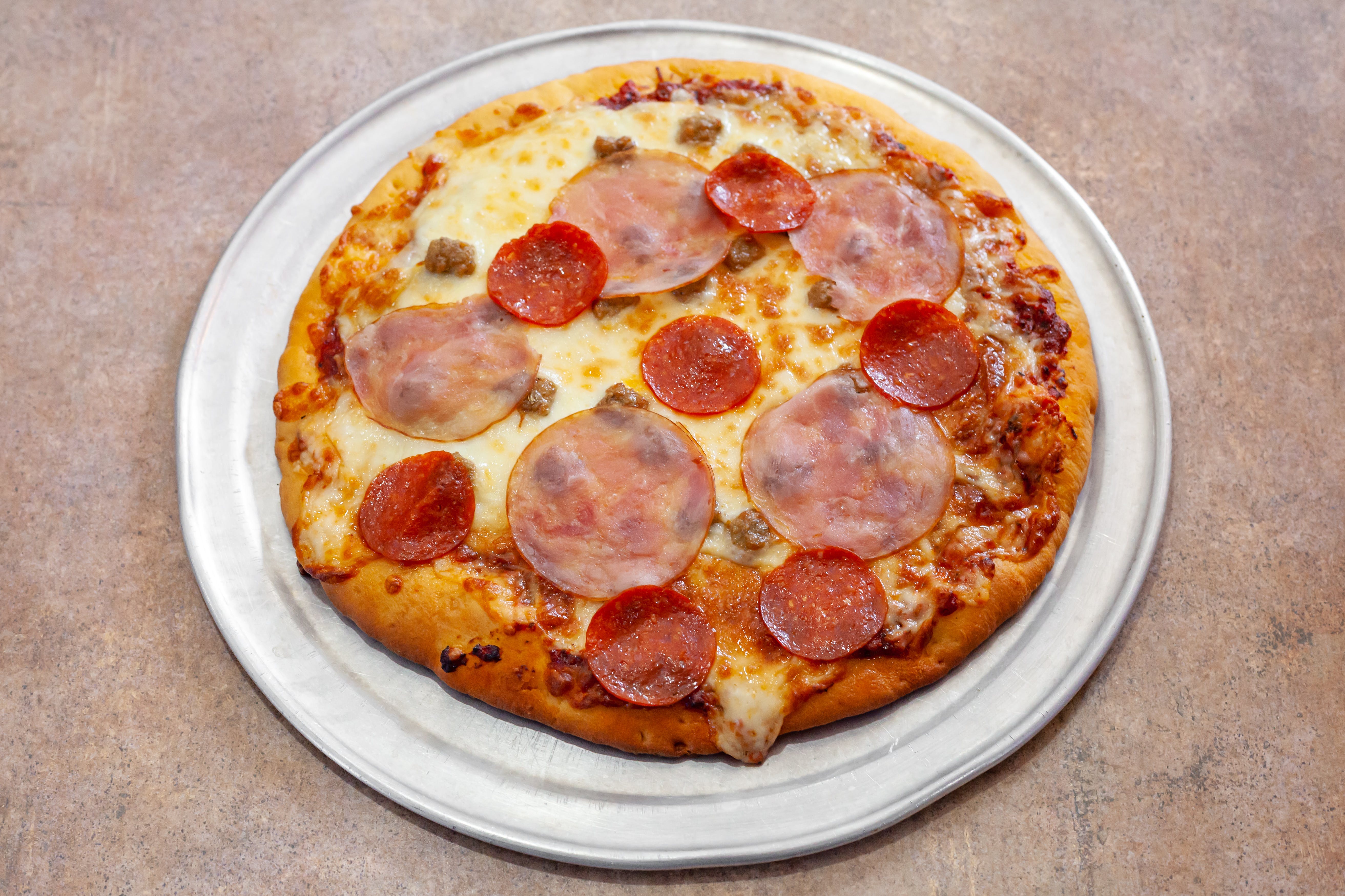 Order Four Meat Pizza - 12" food online from Pasta Jack's store, Benton on bringmethat.com