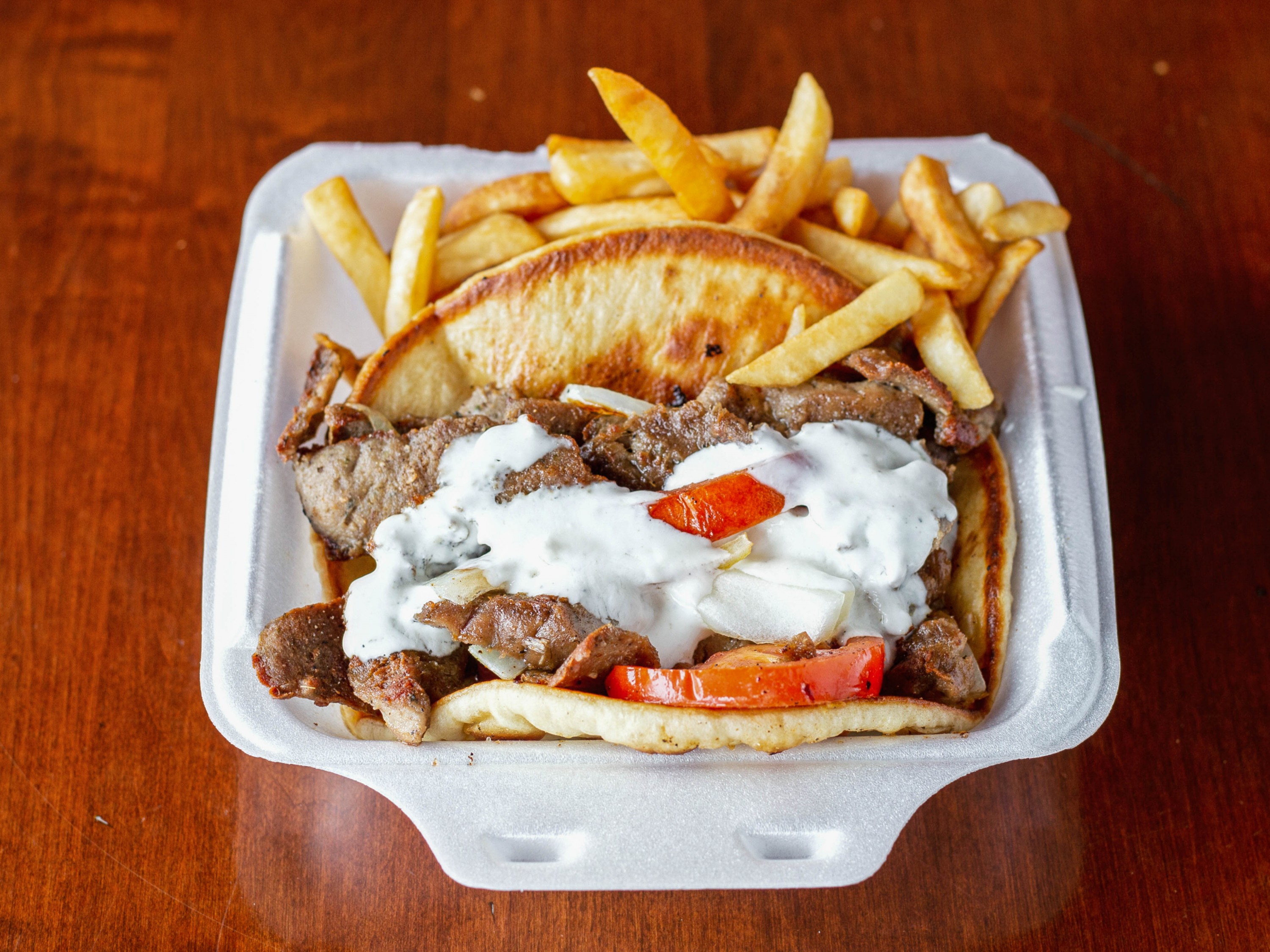 Order Gyro with Fries Combo food online from Kingdom Restaurant store, Madison on bringmethat.com