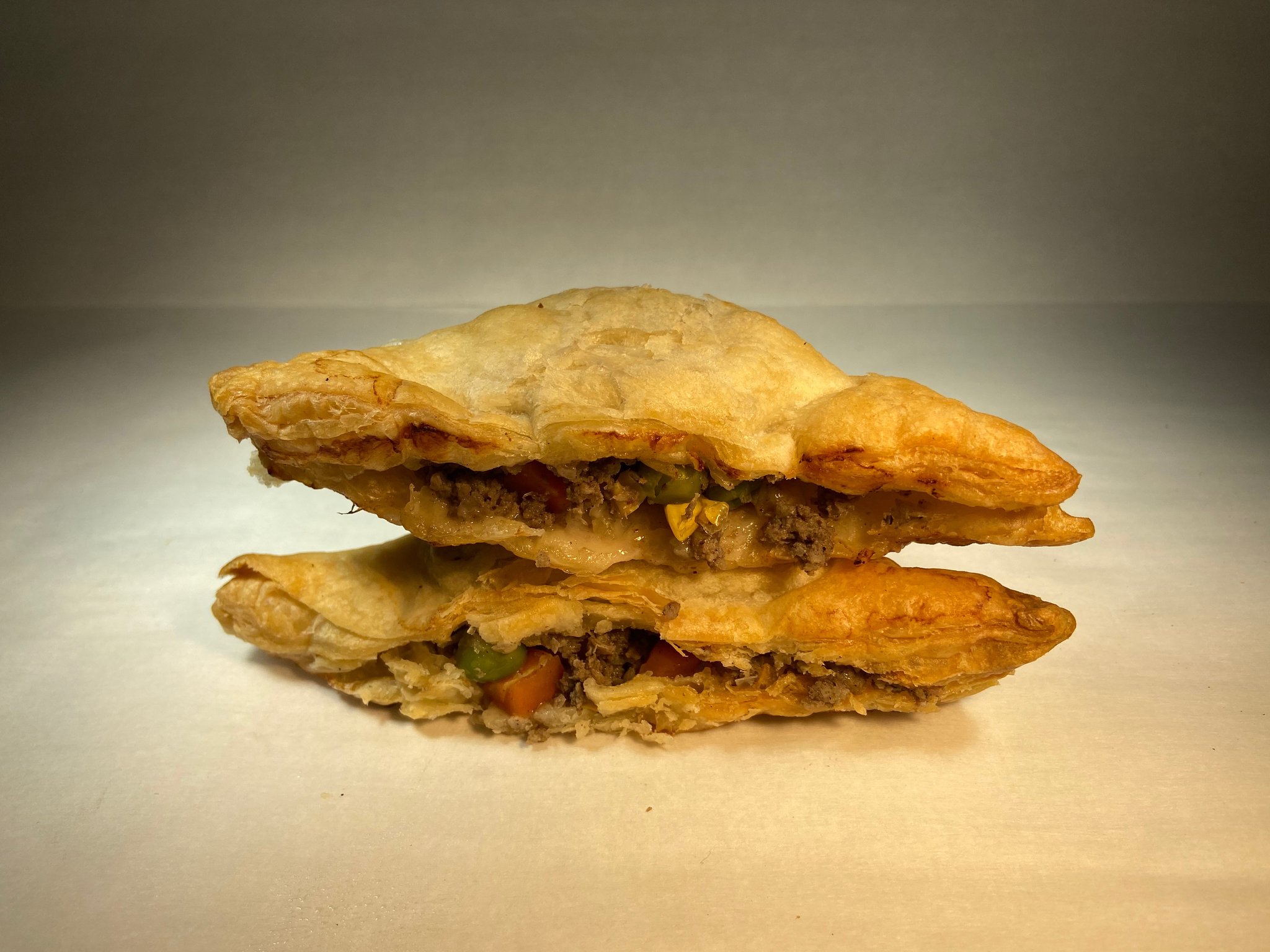 Order Ground Beef with Mix Vegetable Puff Pastry - 2 Pieces food online from Lema Bakery store, Houston on bringmethat.com