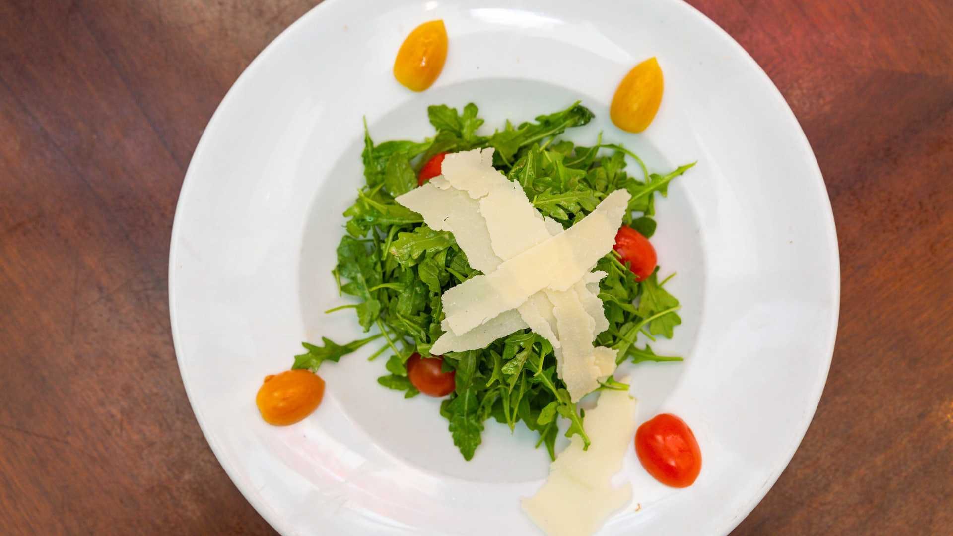 Order Arugula E Parmigiano Salad - Salad food online from Serafina store, New York on bringmethat.com