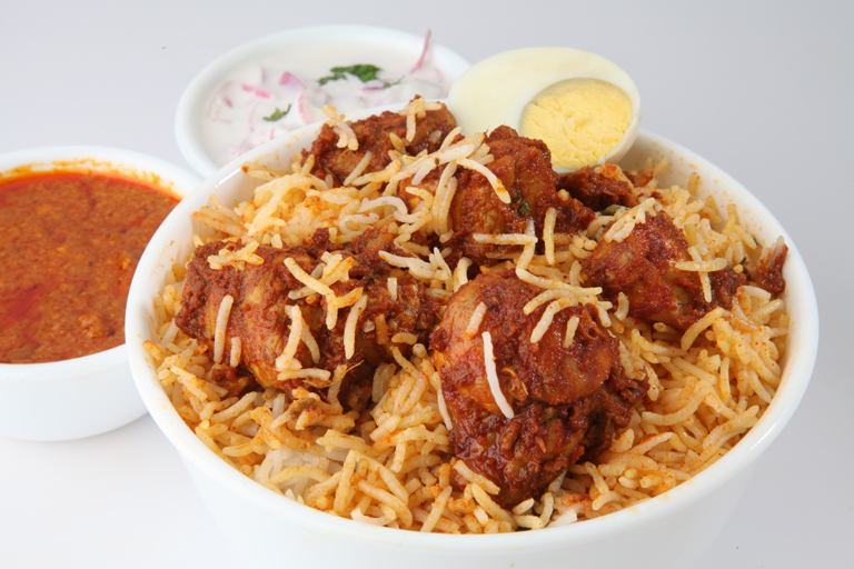 Order Khaleel Bhai Chicken Biryani food online from Ahaa Kitchen store, Irving on bringmethat.com