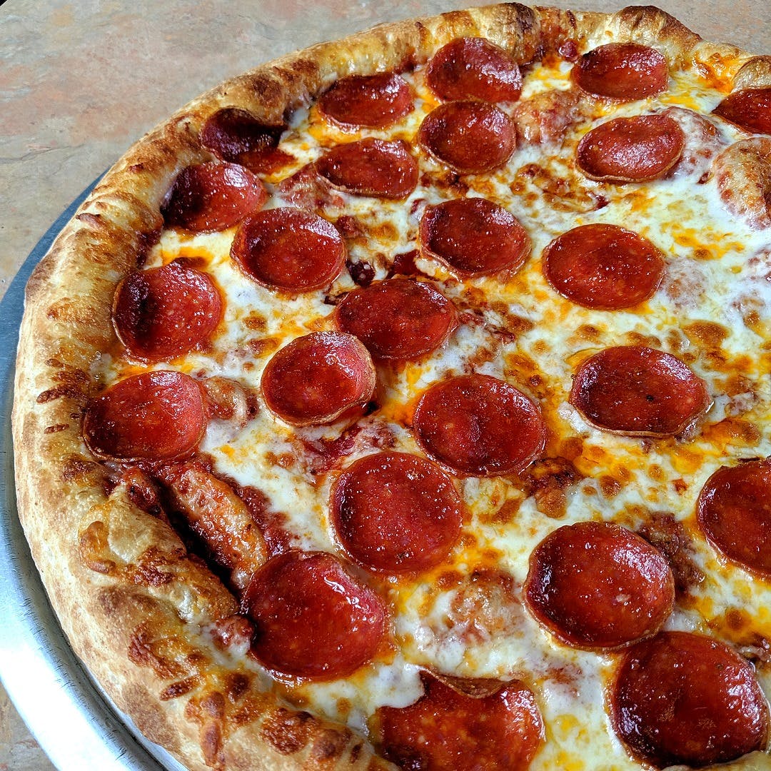 Order Round Cheese Pizza - Small 10'' food online from Cottage Inn Pizza store, Dexter on bringmethat.com