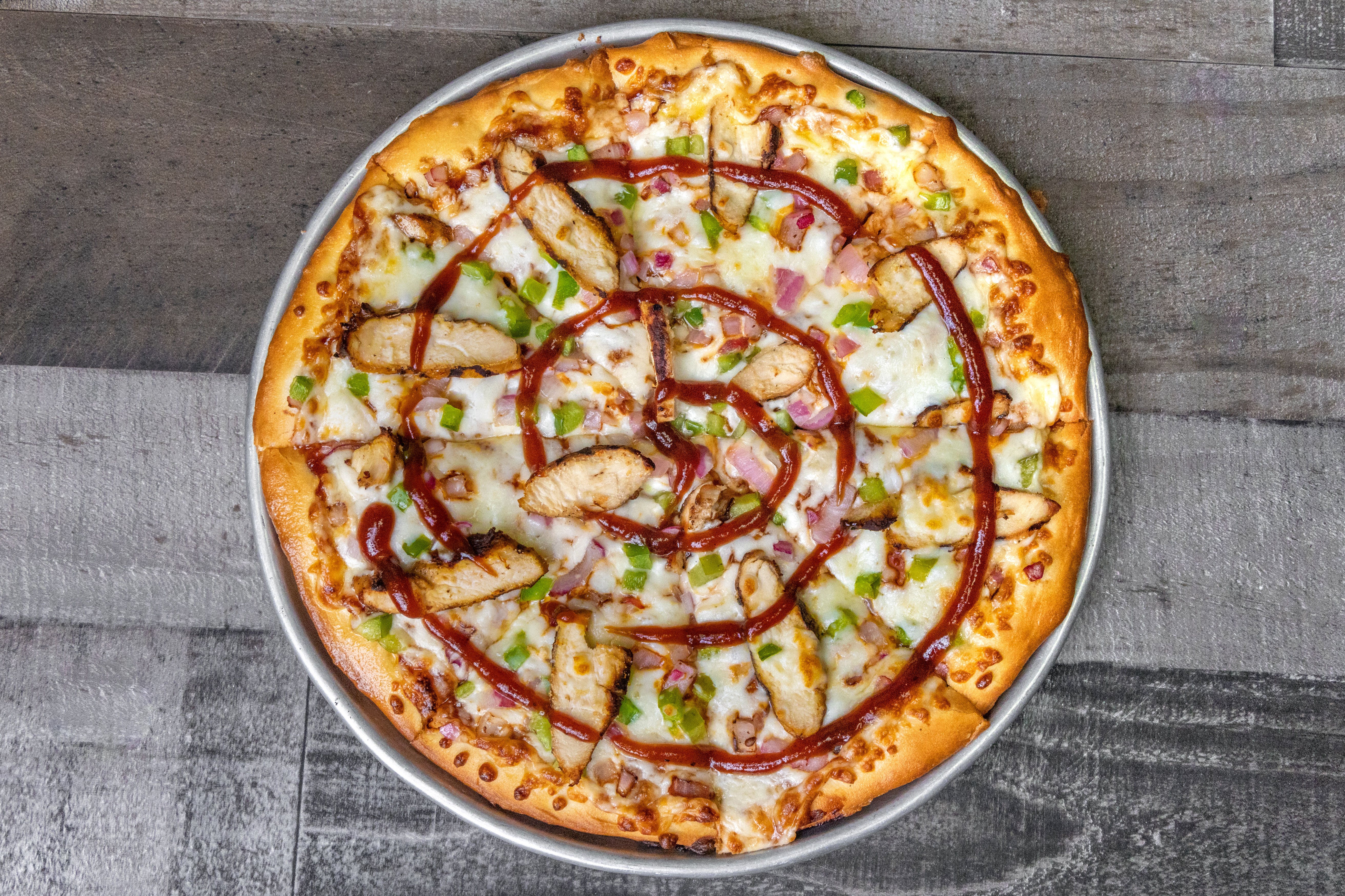 Order BBQ Chicken Pizza - Personal 8'' food online from Jimmy's Pub store, East Lansing on bringmethat.com