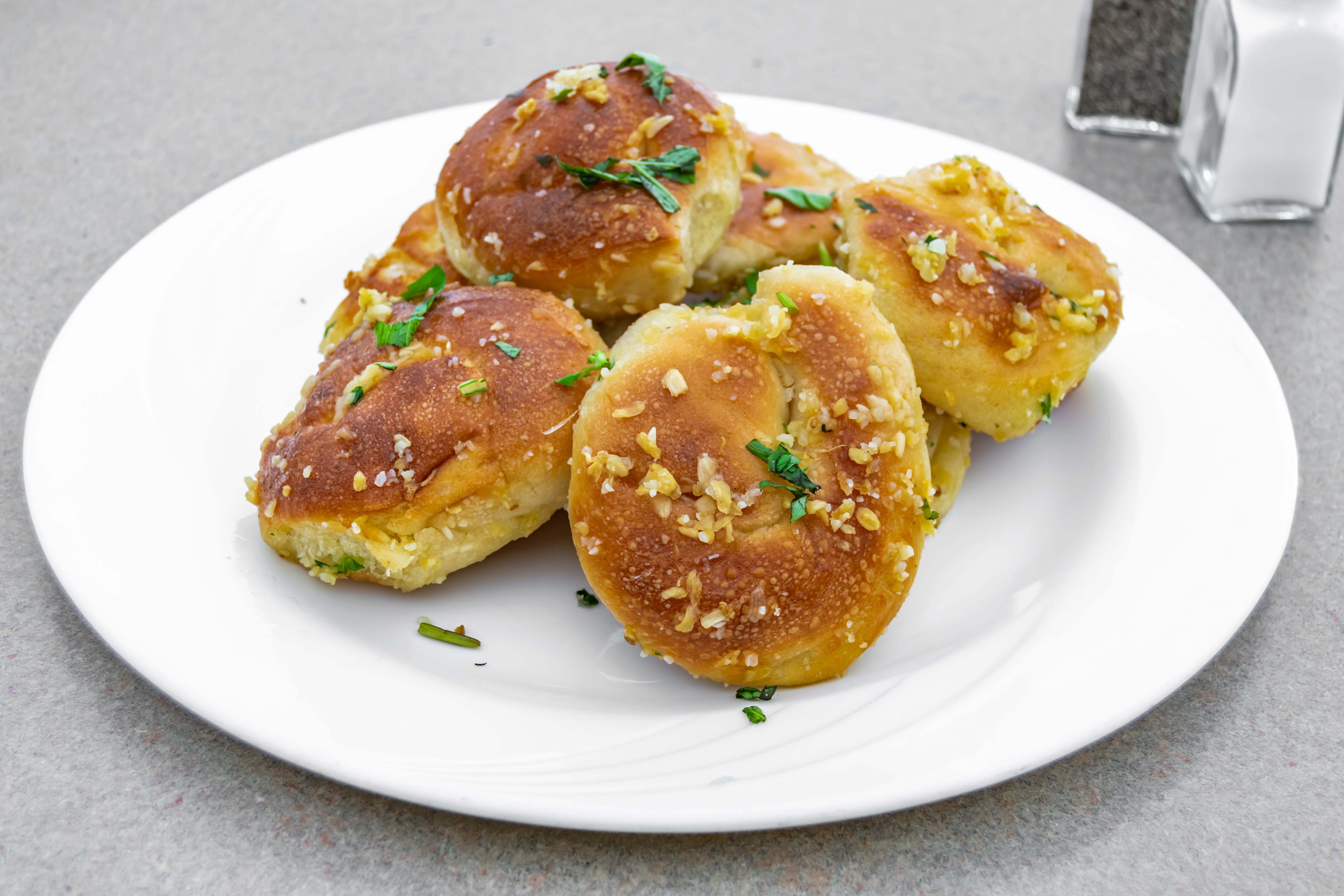 Order Garlic Knots - 6 Pieces food online from Bella Pizza 2 store, Somerset on bringmethat.com