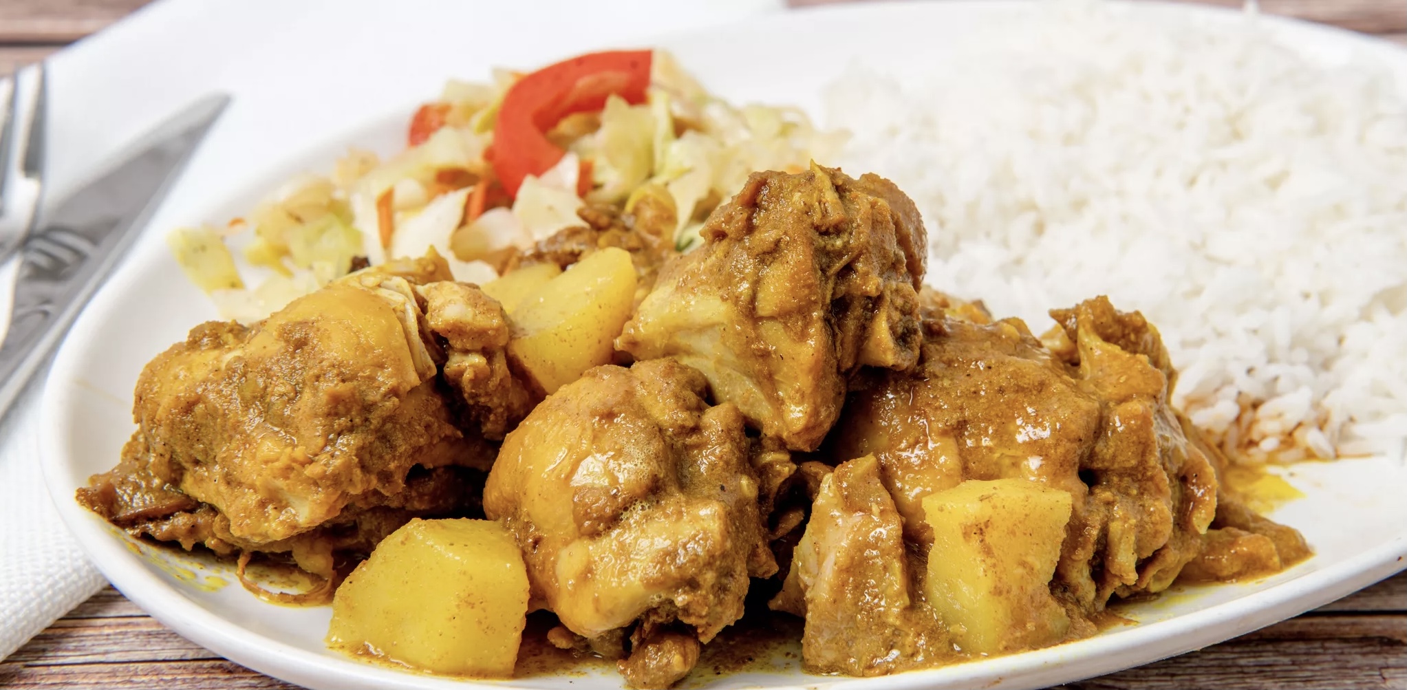 Order Curry Chicken food online from Cool Runnings Eatery store, White Plains on bringmethat.com