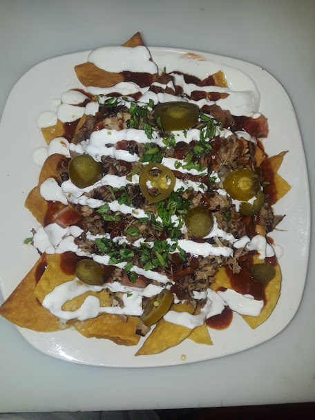 Order Nachos food online from Tailfeather store, Hayward on bringmethat.com