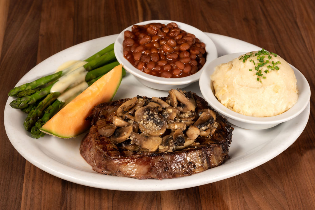 Order 12 oz. Grilled Cajun Cut with Mushrooms Prime Rib-after 4 PM food online from Naples Rib Co store, Long Beach on bringmethat.com