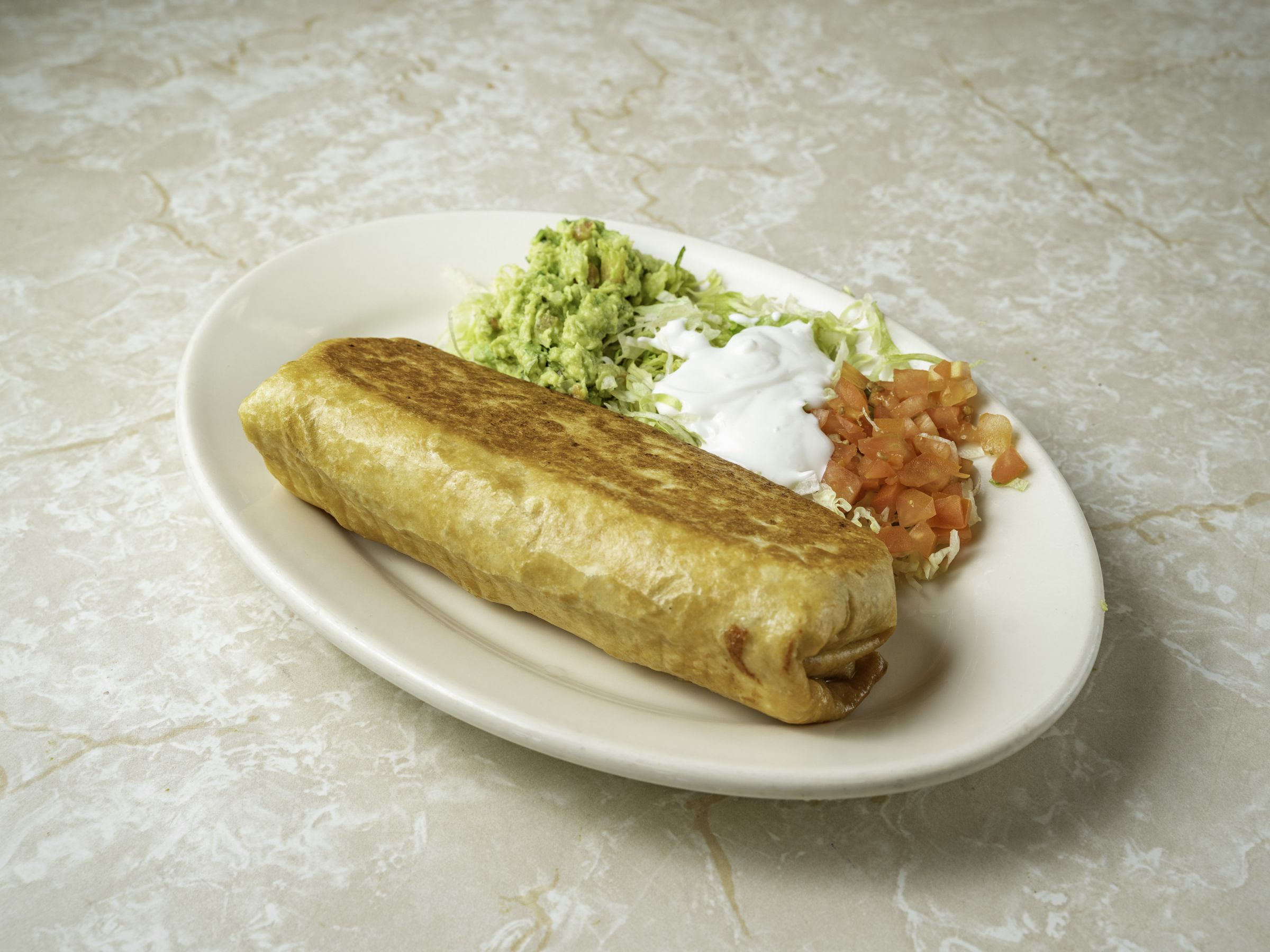 Order Chimichanga food online from Taqueria Los Comales store, Chicago on bringmethat.com
