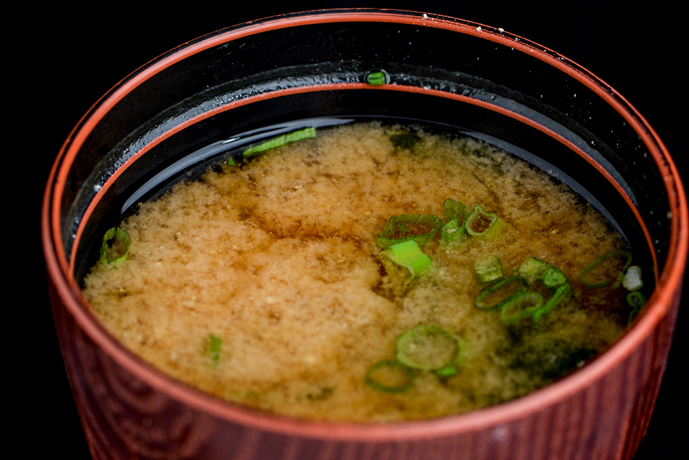 Order Miso Soup food online from Kome Sushi And Fusion Restaurant store, Garden Grove on bringmethat.com