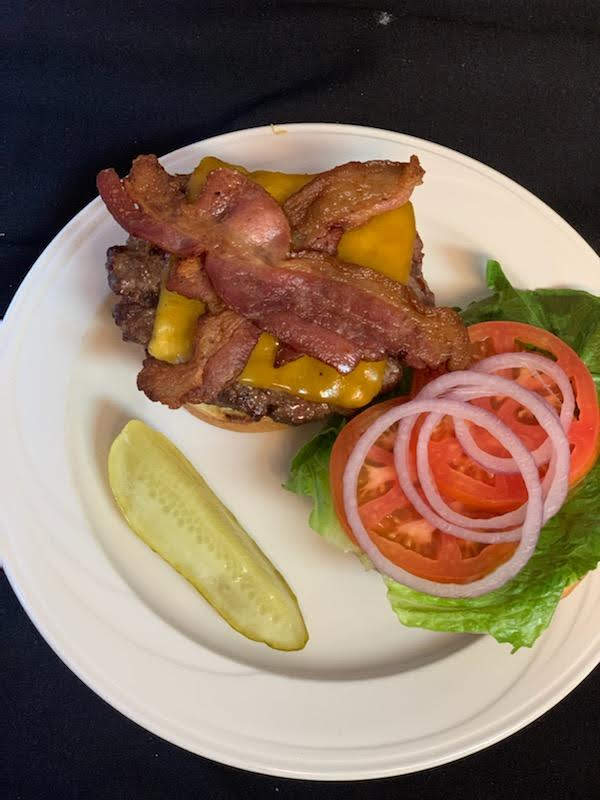 Order Chef Dialo's Deluxe Cheddar and Bacon Burger food online from Dialos Cafe store, Benton Harbor on bringmethat.com