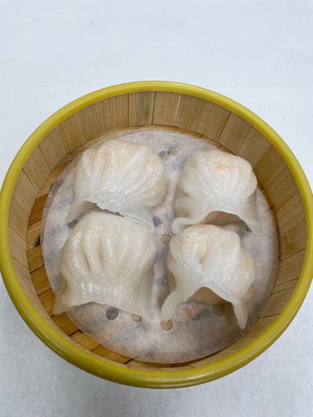 Order 20. Steamed Shrimp Dumpling with Pork   水晶蝦餃 food online from Dim Sum Bistro store, San Francisco on bringmethat.com