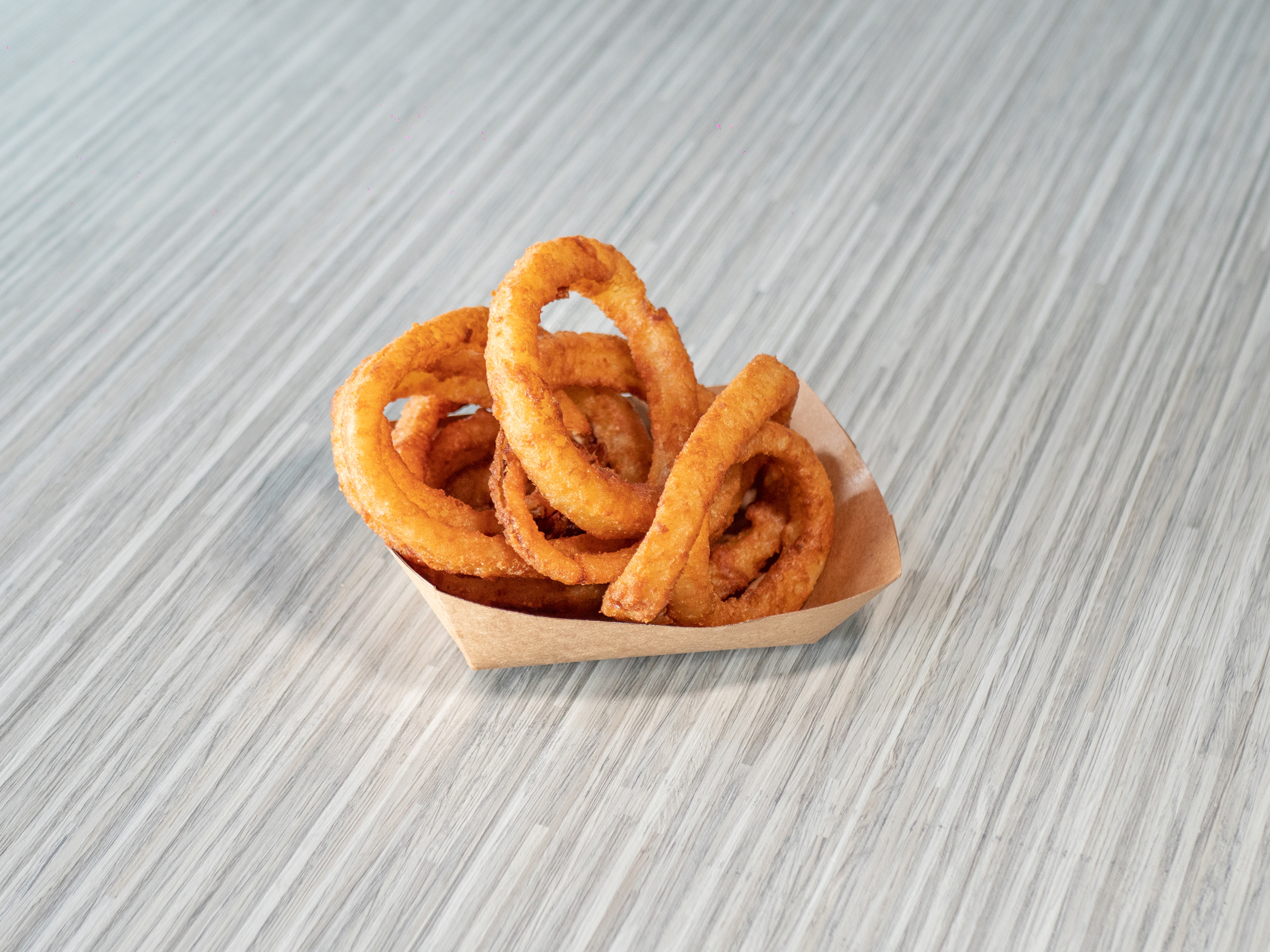 Order Onion Rings food online from OC Burgers store, Fort Worth on bringmethat.com