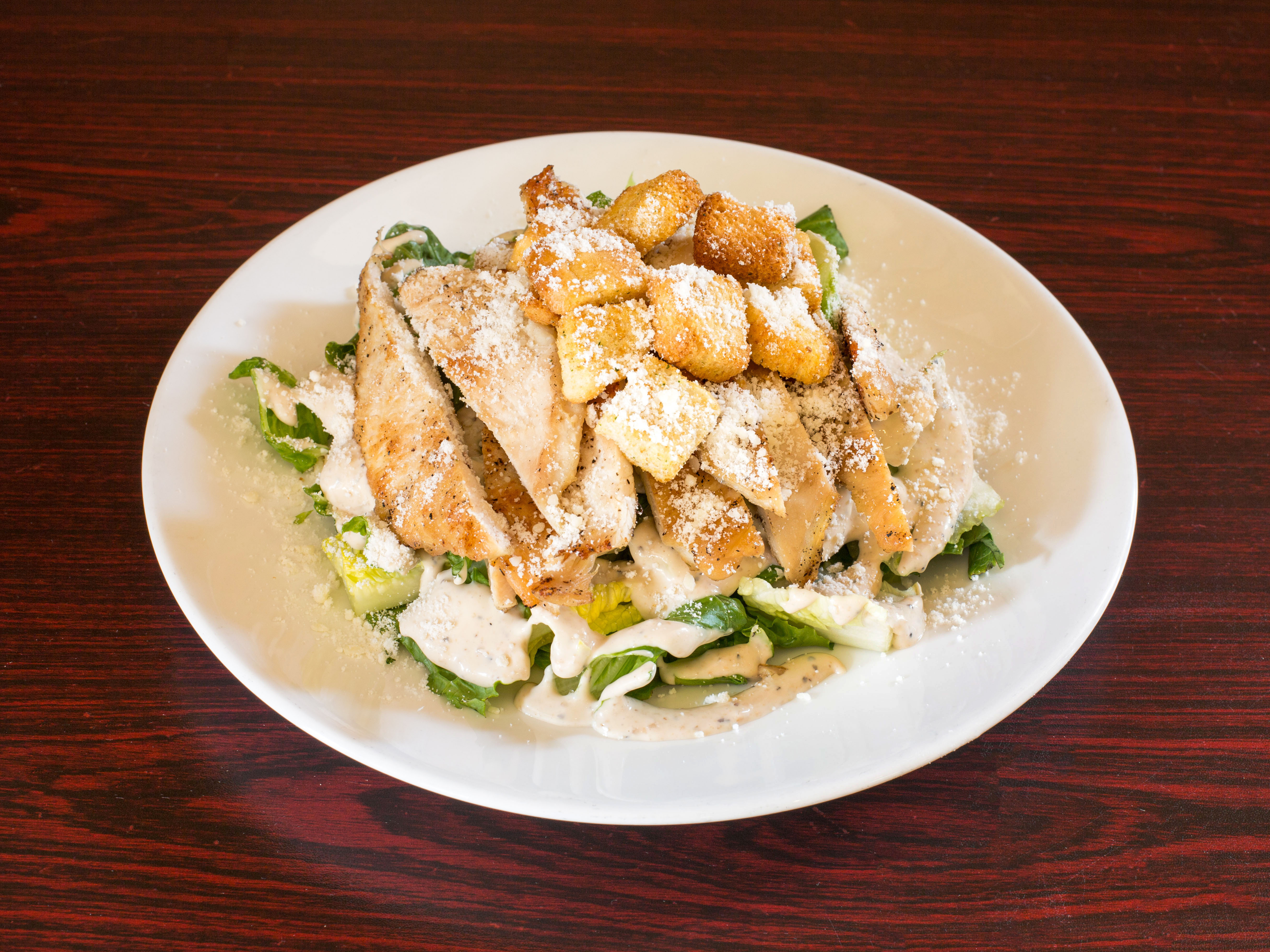 Order Caesar Salad food online from Carmine's Pizza Factory store, Jersey City on bringmethat.com
