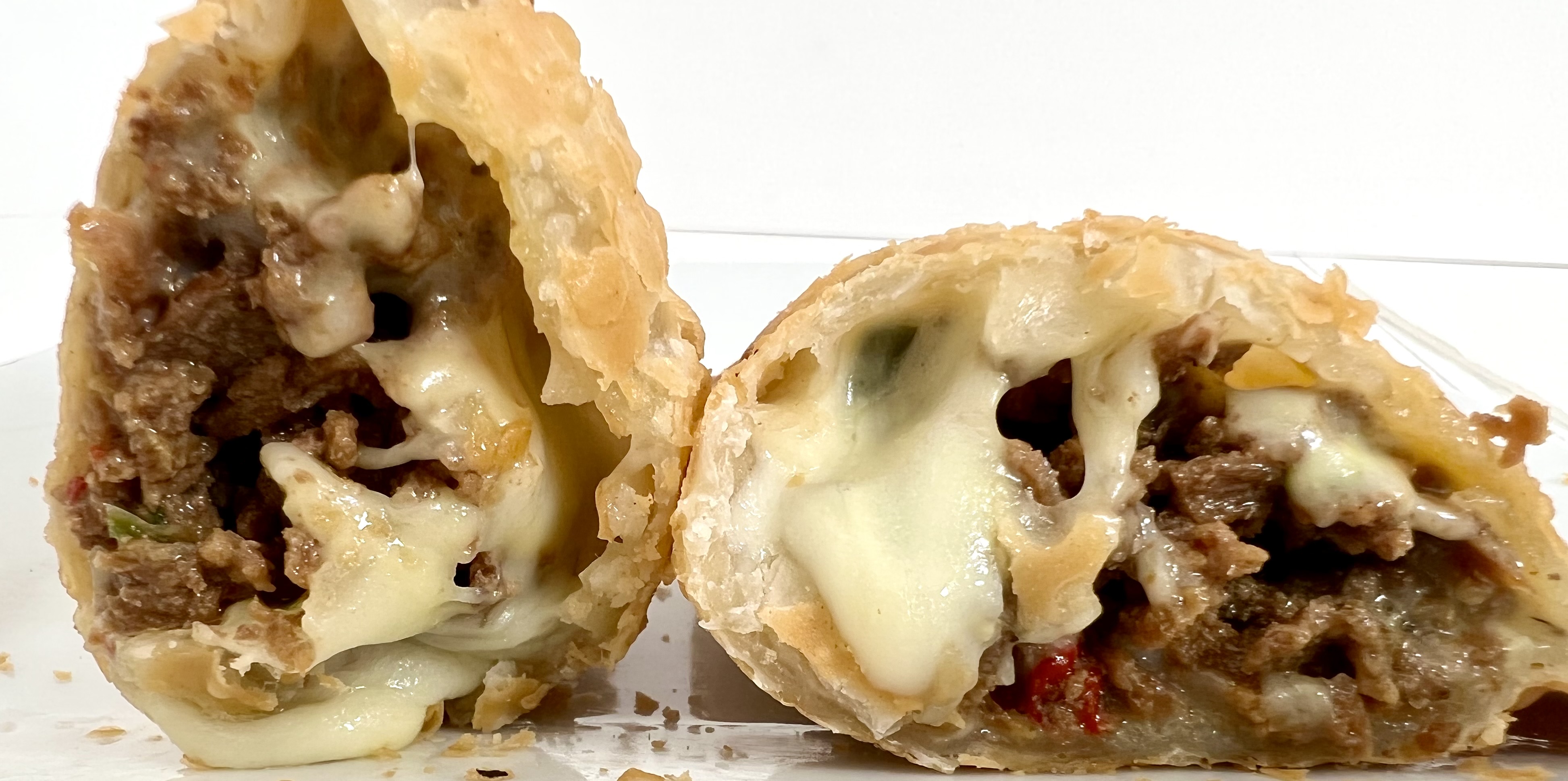 Order Philly Cheesesteak Empanada food online from Mambo Empanadas store, Rutherford on bringmethat.com