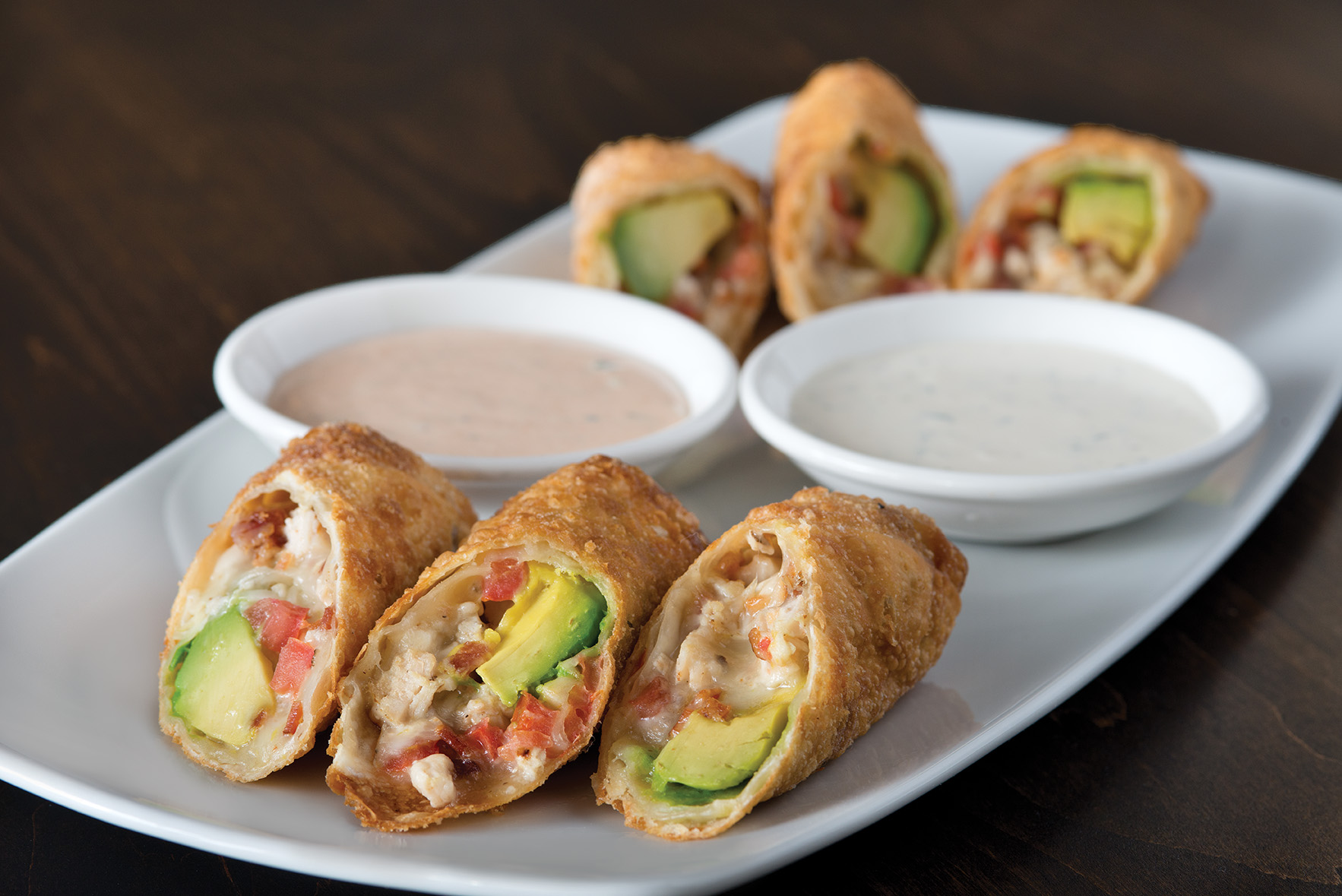 Order Avocado Club Egg Rolls food online from California Pizza Kitchen - River City Dr store, Jacksonville on bringmethat.com