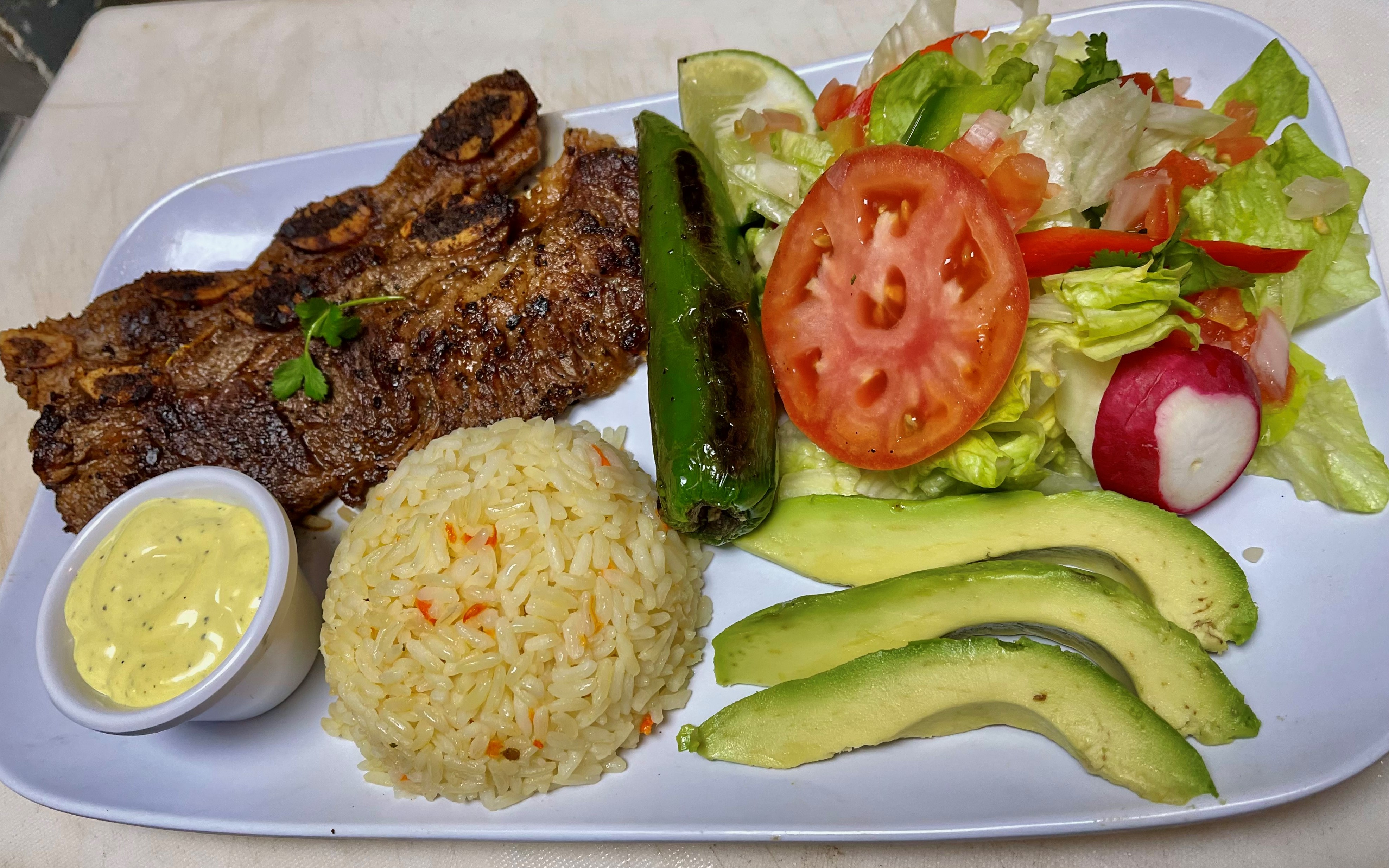 Order Costillas asadas de Res ( Grilled Beef Ribs) food online from El Mexireno store, Oxon Hill on bringmethat.com