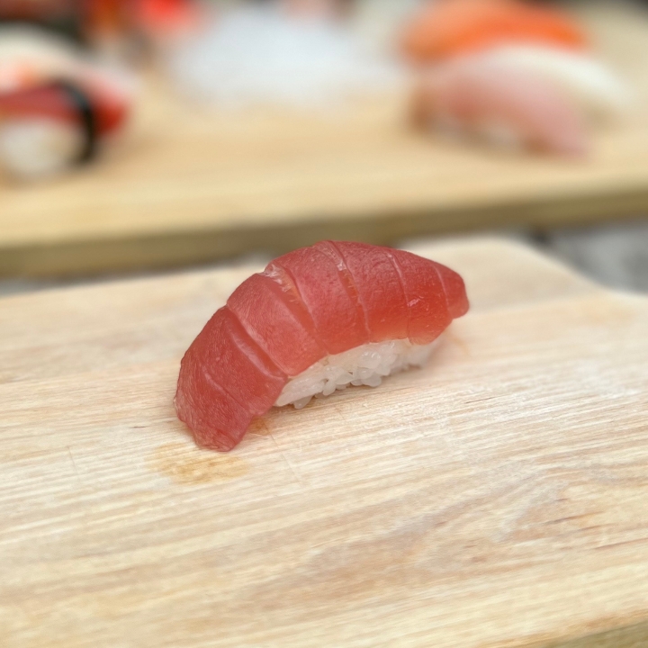 Order Maguro Nigiri food online from Tanuki sushi store, Chicago on bringmethat.com