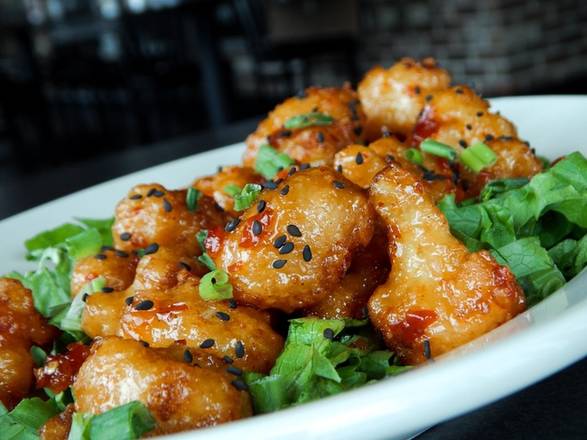 Order Sweet Chili Cauliflower Bites - Full food online from Monk's Bar & Grill store, Middleton on bringmethat.com