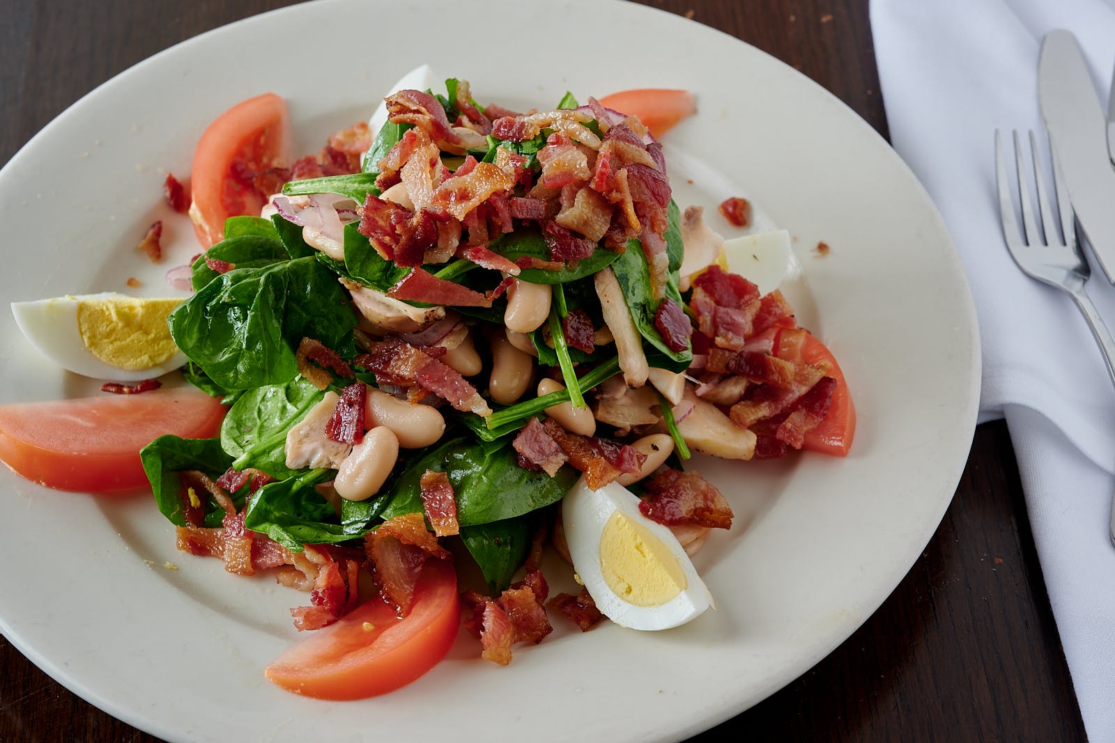 Order Spinach & Bacon Salad - Salad food online from Mario's Restaurant store, Clifton on bringmethat.com
