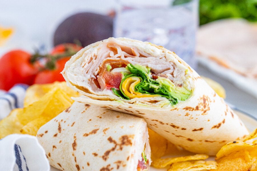 Order Turkey Club Wrap food online from Tastefully Yours Cafe store, Coraopolis on bringmethat.com