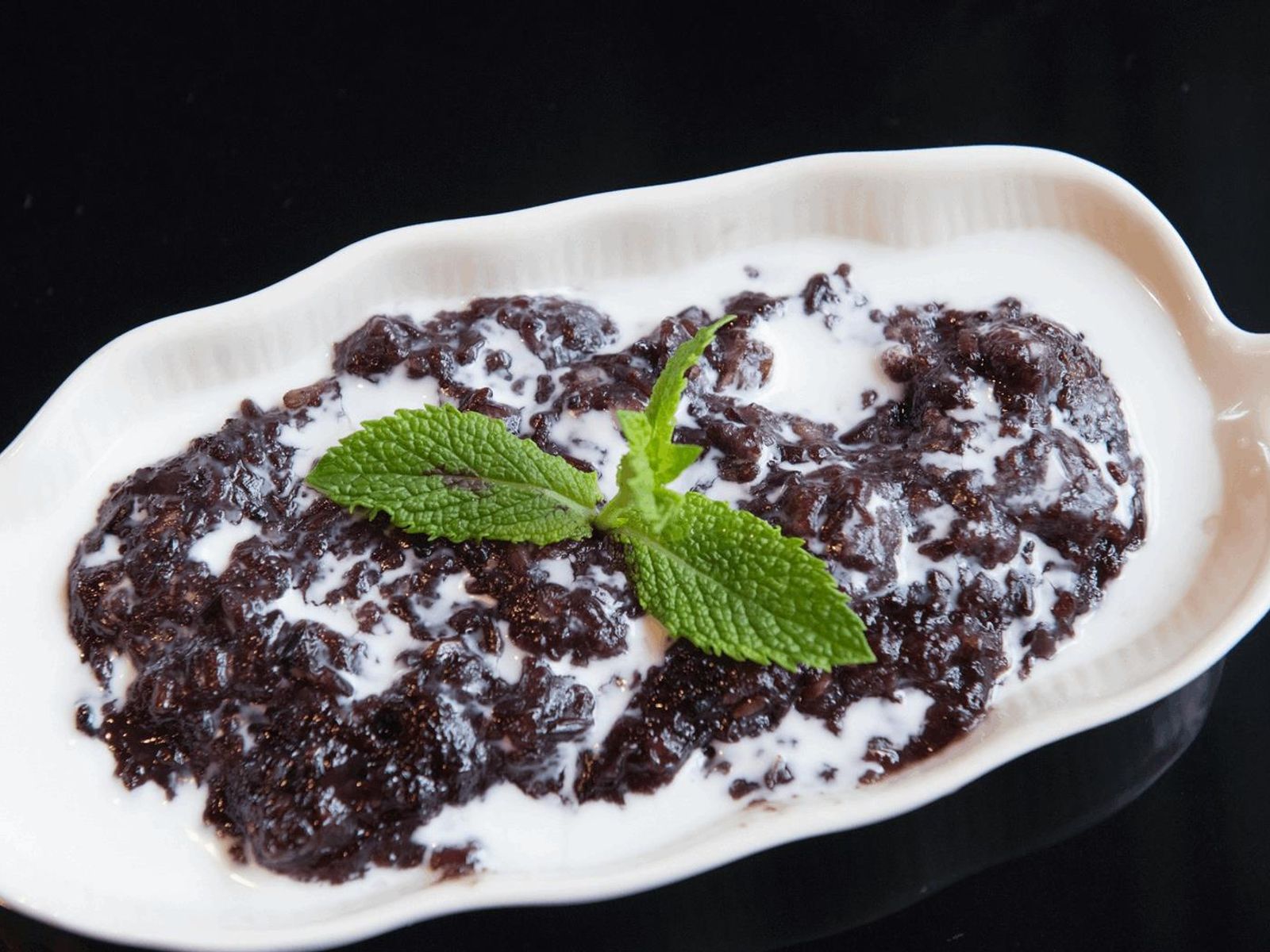 Order Black Sticky Rice Pudding food online from Thai Thani Kitchen store, Seattle on bringmethat.com