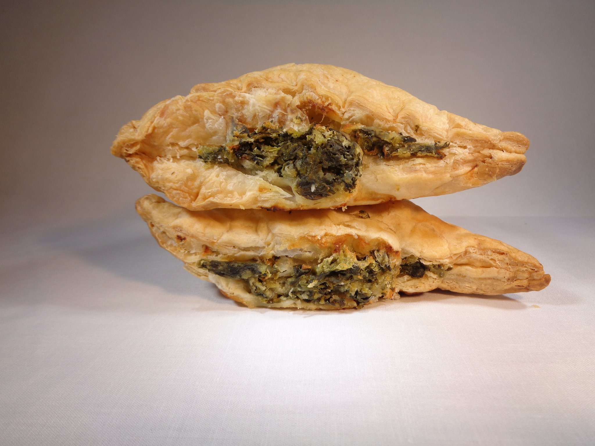 Order Spinach with Sumac Puff Pastry - 2 Pieces food online from Lema Bakery store, Houston on bringmethat.com