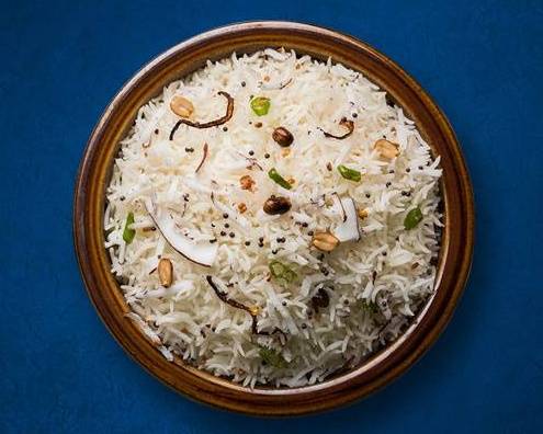 Order Coconut Rice food online from Indian Vegan Experiment store, Denville, on bringmethat.com