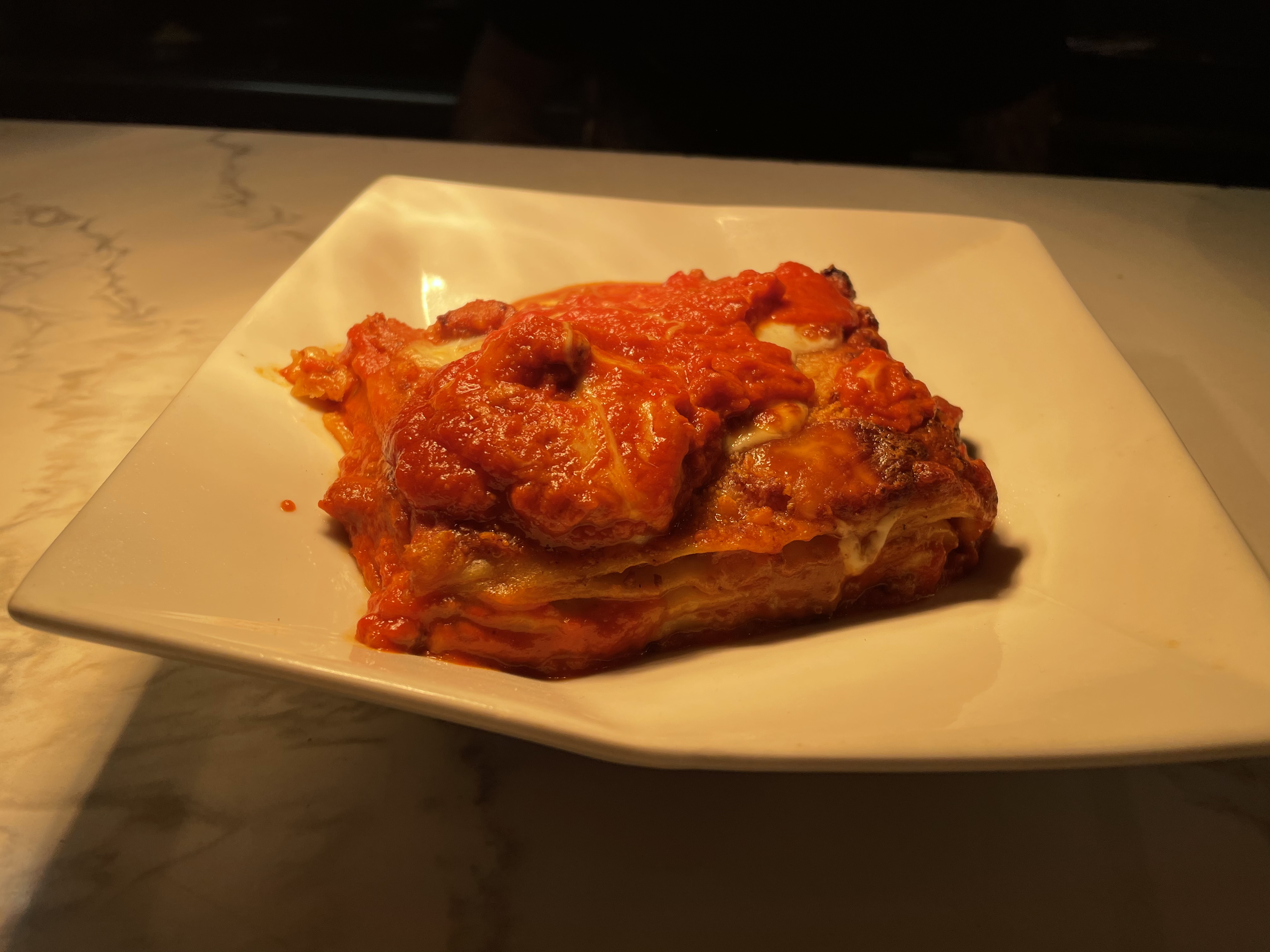 Order Lasagna food online from H.O.M Italian Eatery store, Woodland Hills on bringmethat.com